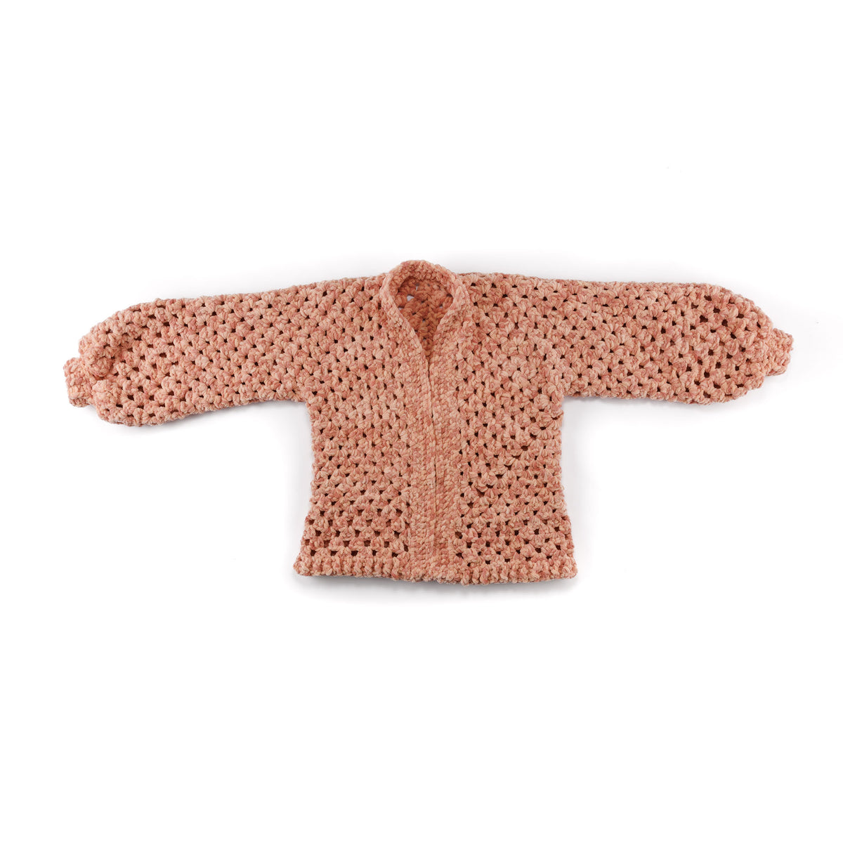 Hexi Hug Crochet Blanket Cardigan made using Bernat yarn in a styled lifestyle setting