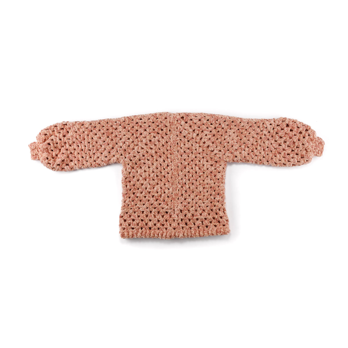 Hexi Hug Crochet Blanket Cardigan made using Bernat yarn in a styled lifestyle setting