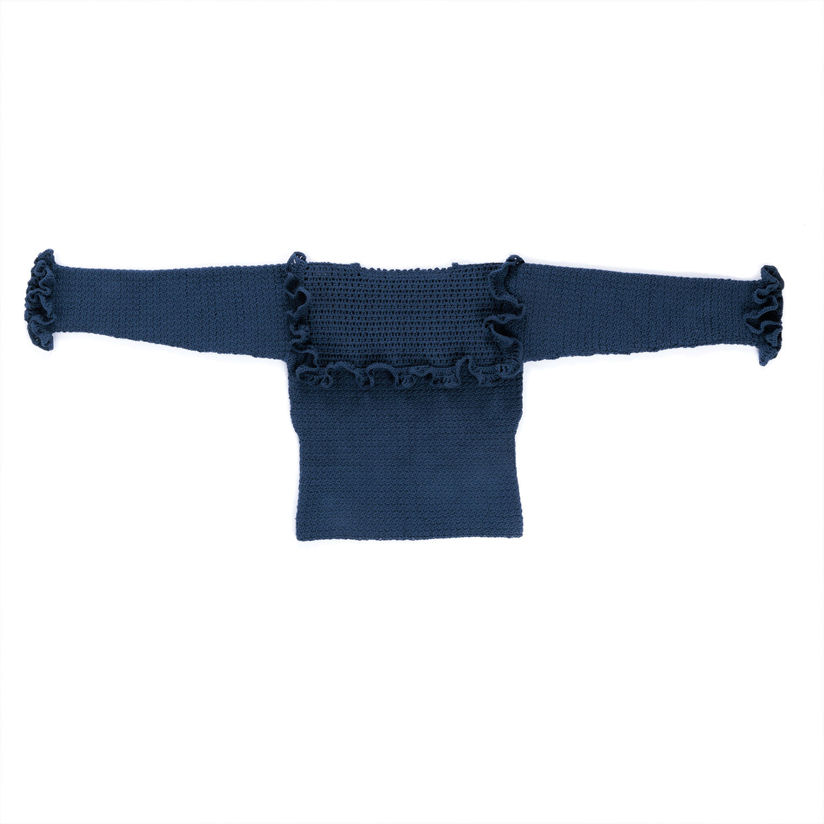 Crochet Vintage Ruffle Top made using Bernat yarn in a styled lifestyle setting