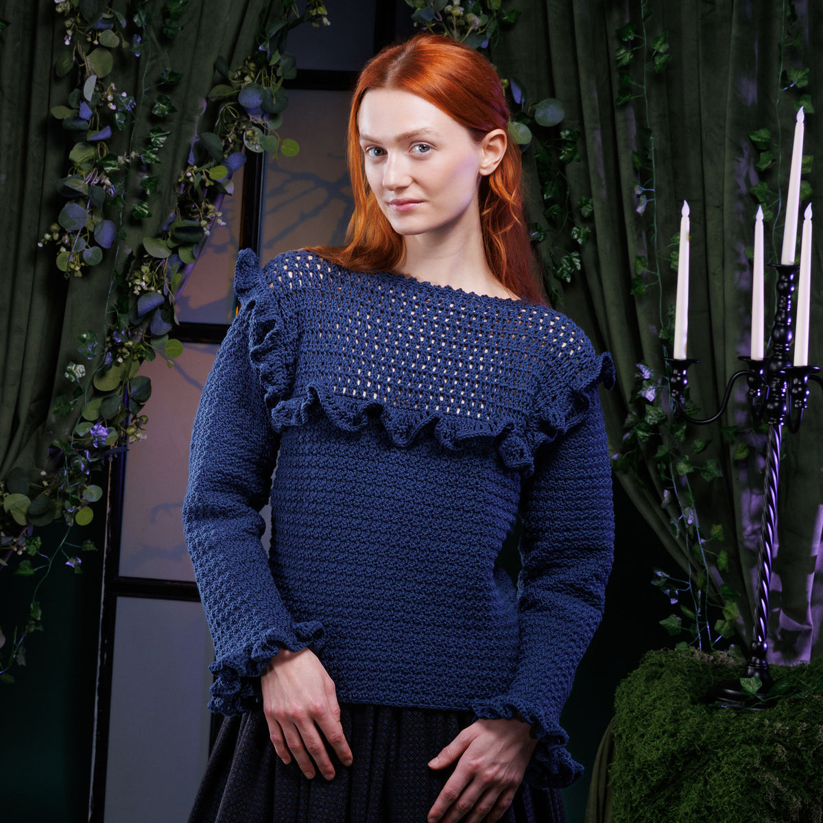 Crochet Vintage Ruffle Top made using Bernat yarn in a styled lifestyle setting