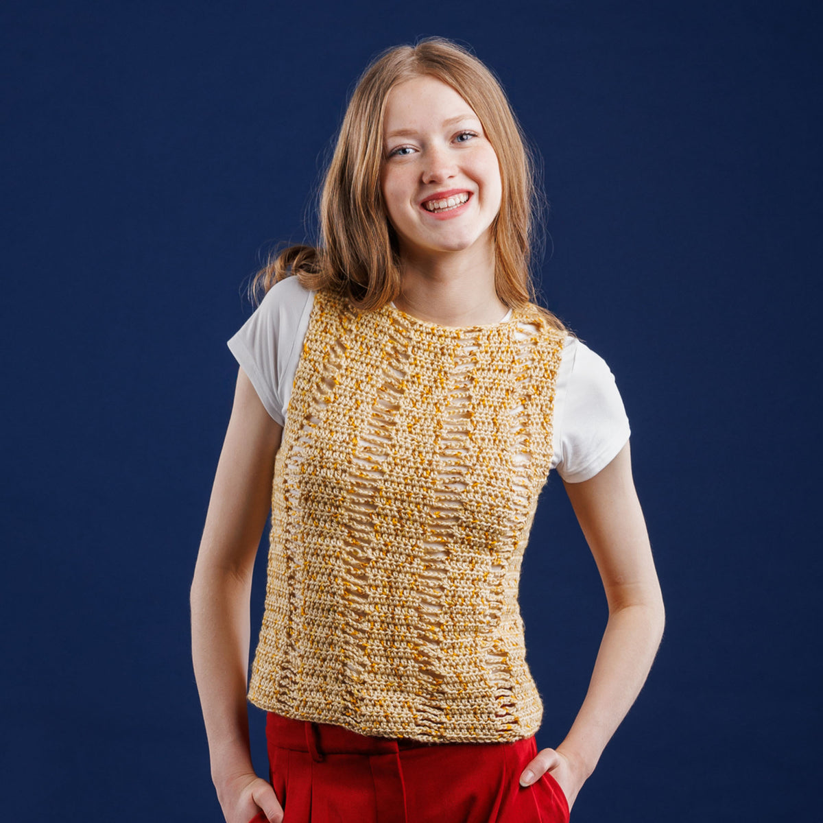 Off The Chain Crochet Tank made using Caron yarn in a styled lifestyle setting