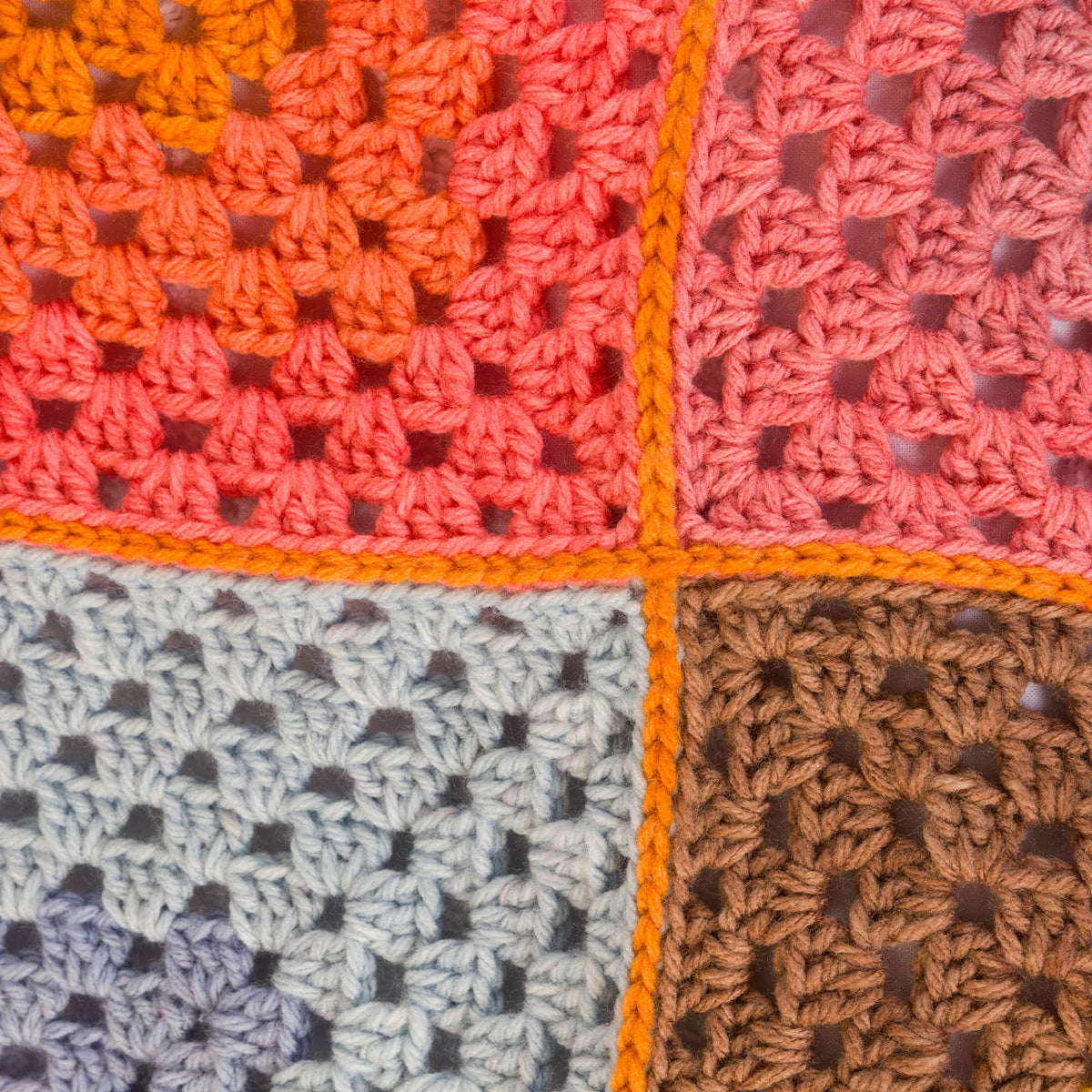 Crochet Quadrant Granny Blanket made using Caron yarn