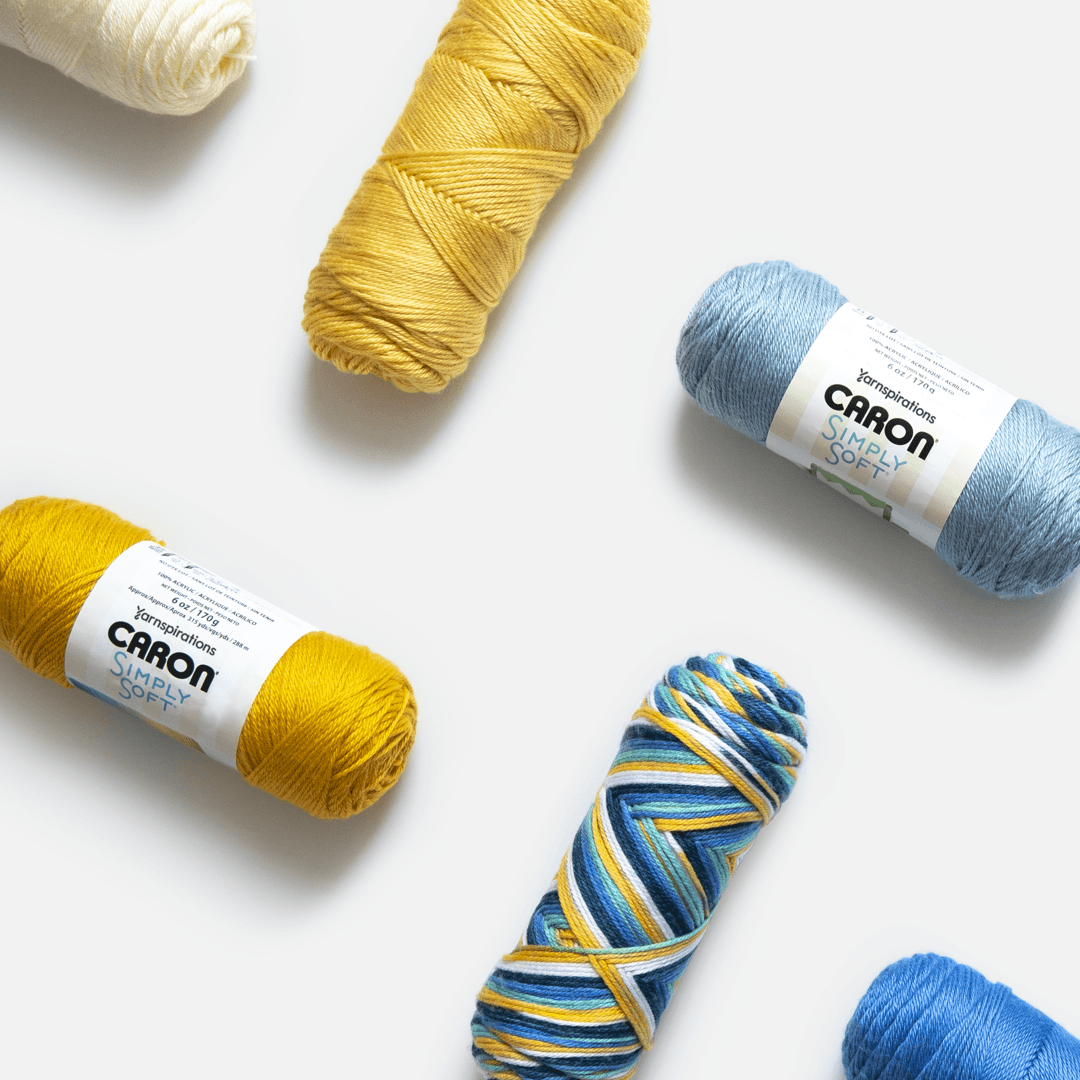 Caron brand's yarns on a white background.