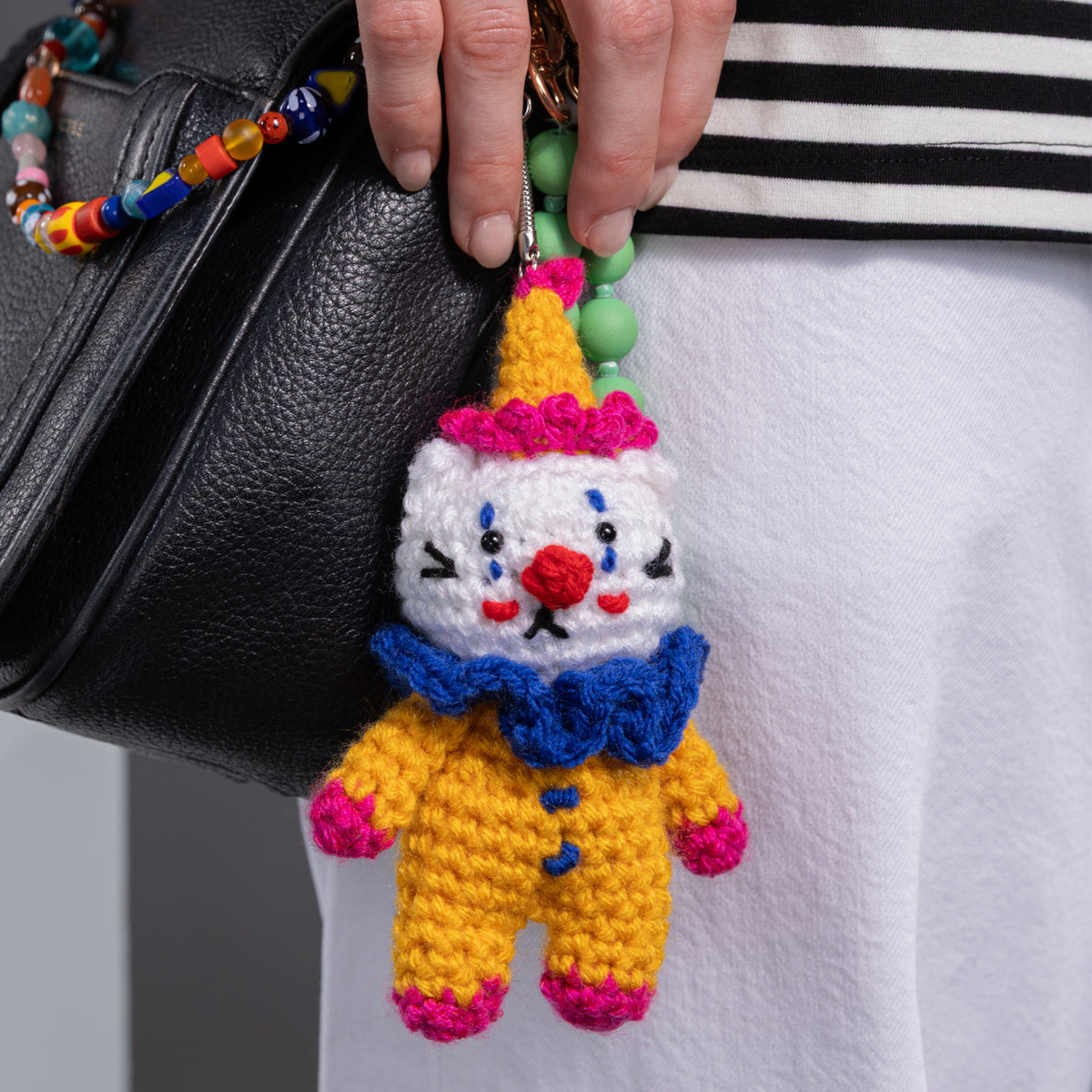 Cobbles The Cat Clown Crochet Charm made using Red Heart yarn