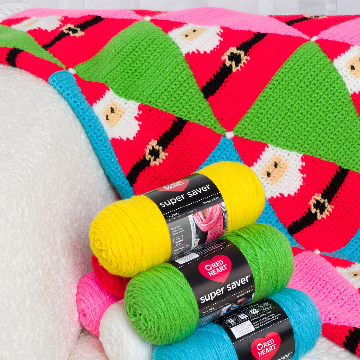 Santa'S Coming To Town Crochet Blanket made using Red Heart yarn