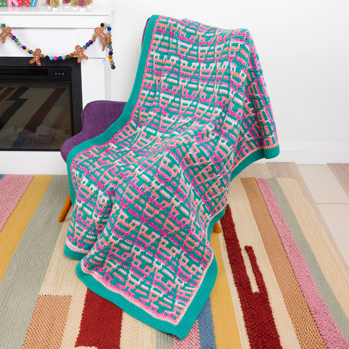 Sunrise Forest Mosaic Crochet Blanket made using Red Heart yarn