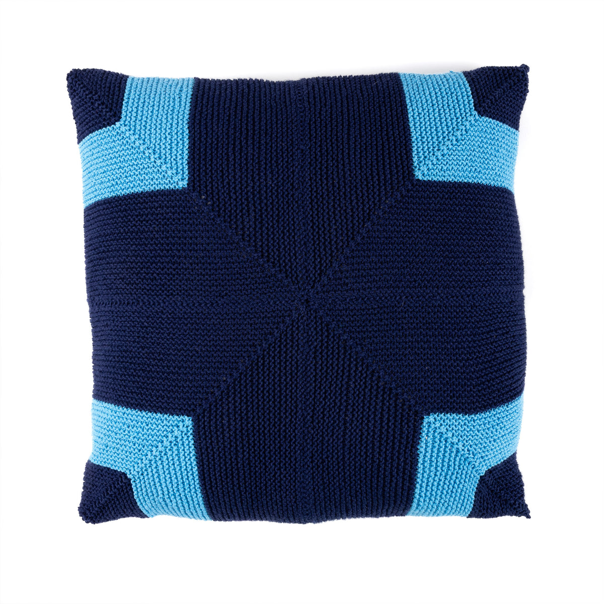 Knitted pillow with blue and navy pattern on a white background, Indigo