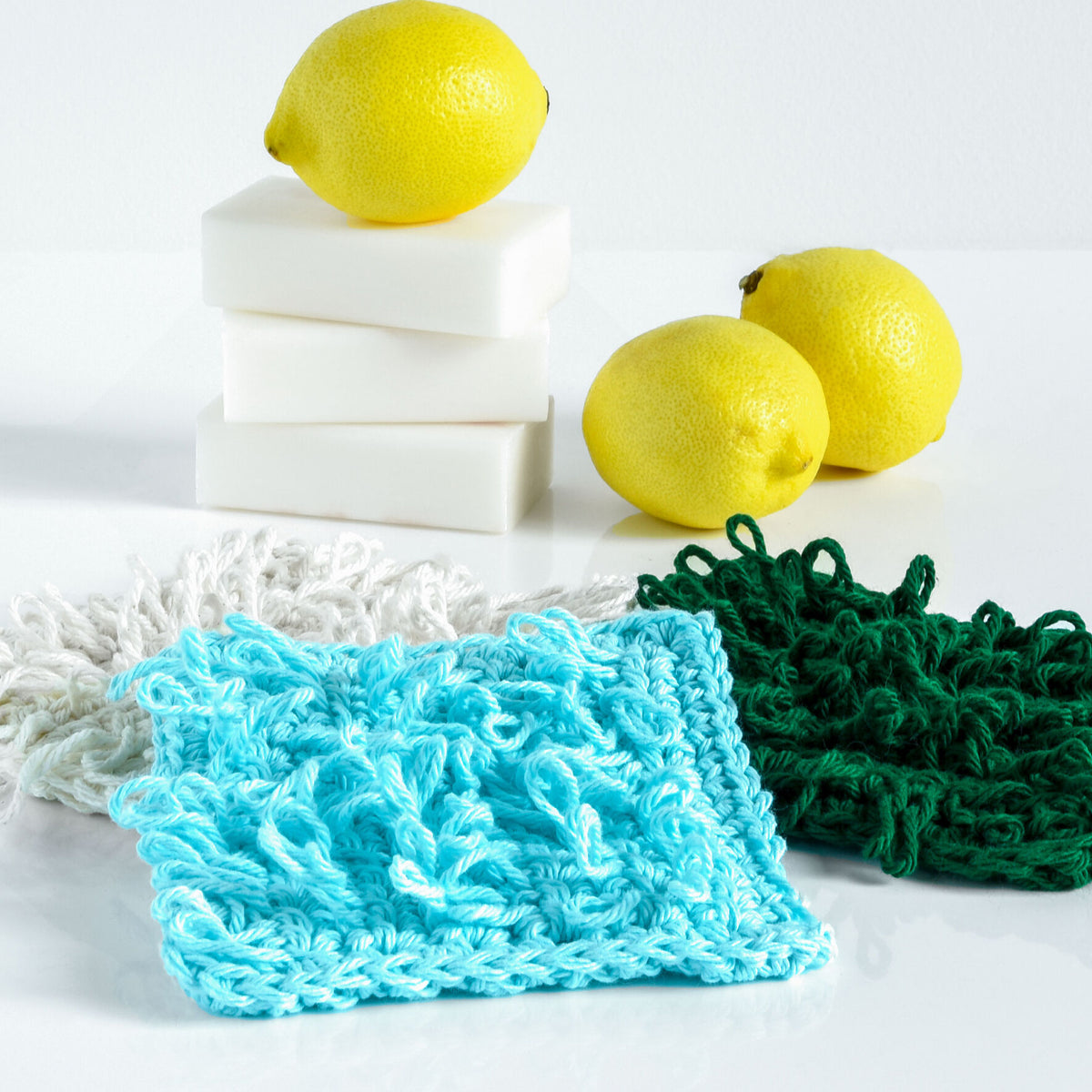 Loopy Crochet Scrub Cloth in white, blue, and green