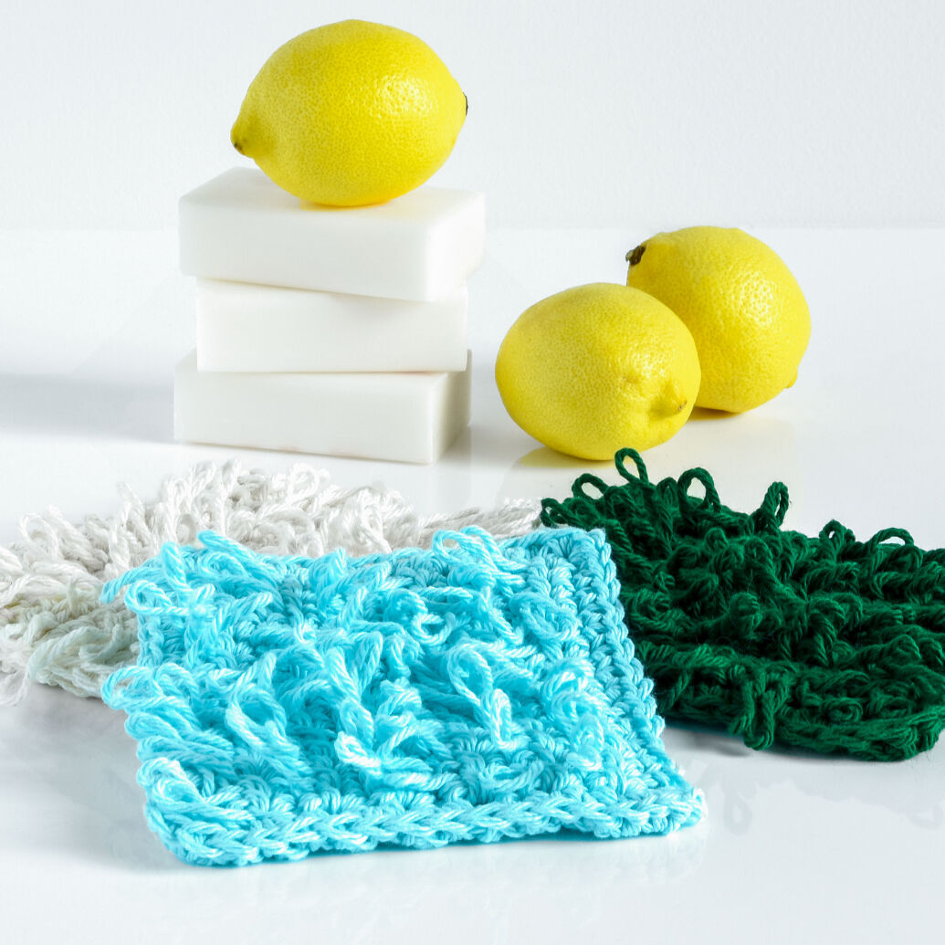 Loopy Crochet Scrub Cloth in white, blue, and green