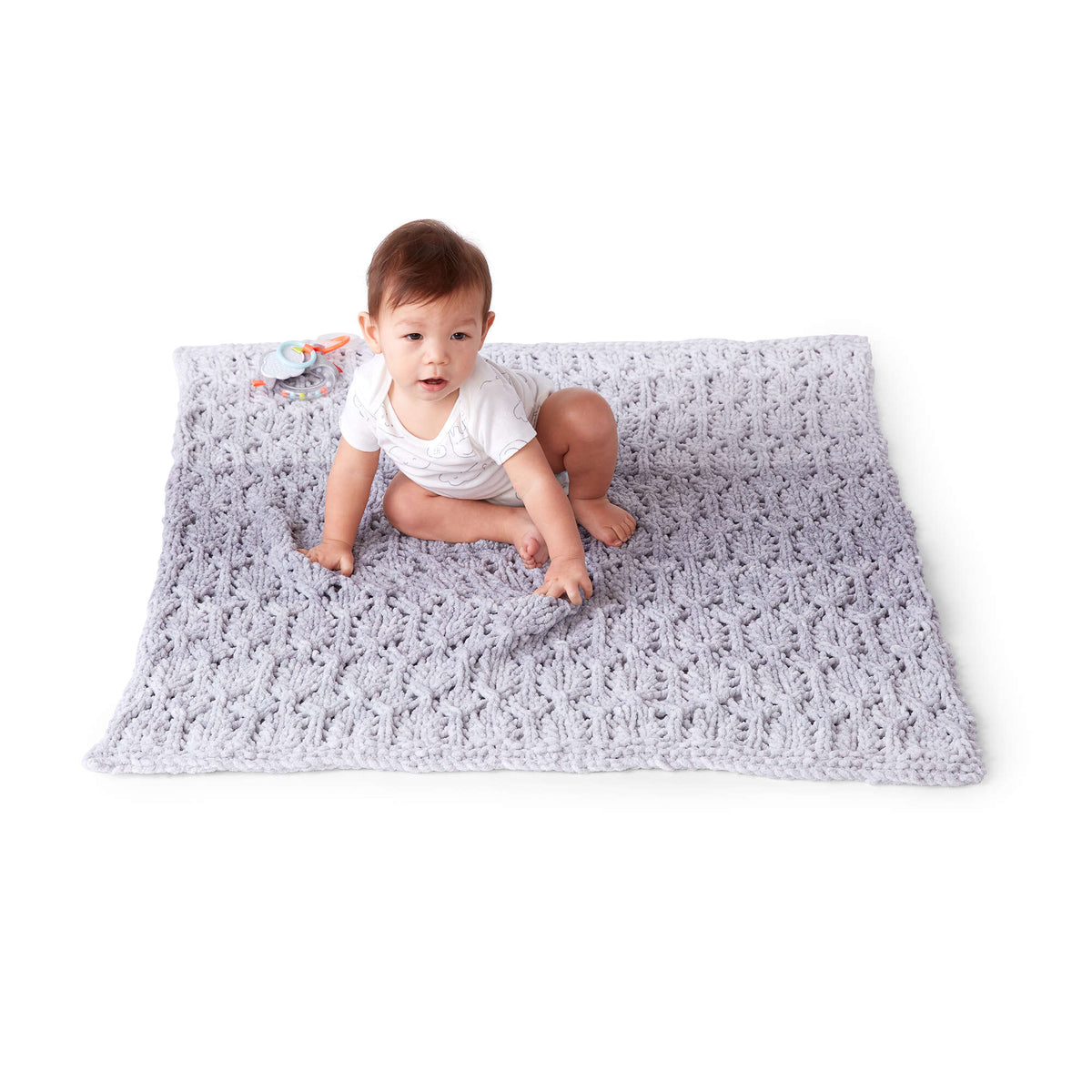 Knit Blanket made in Bernat Baby Blanket yarn