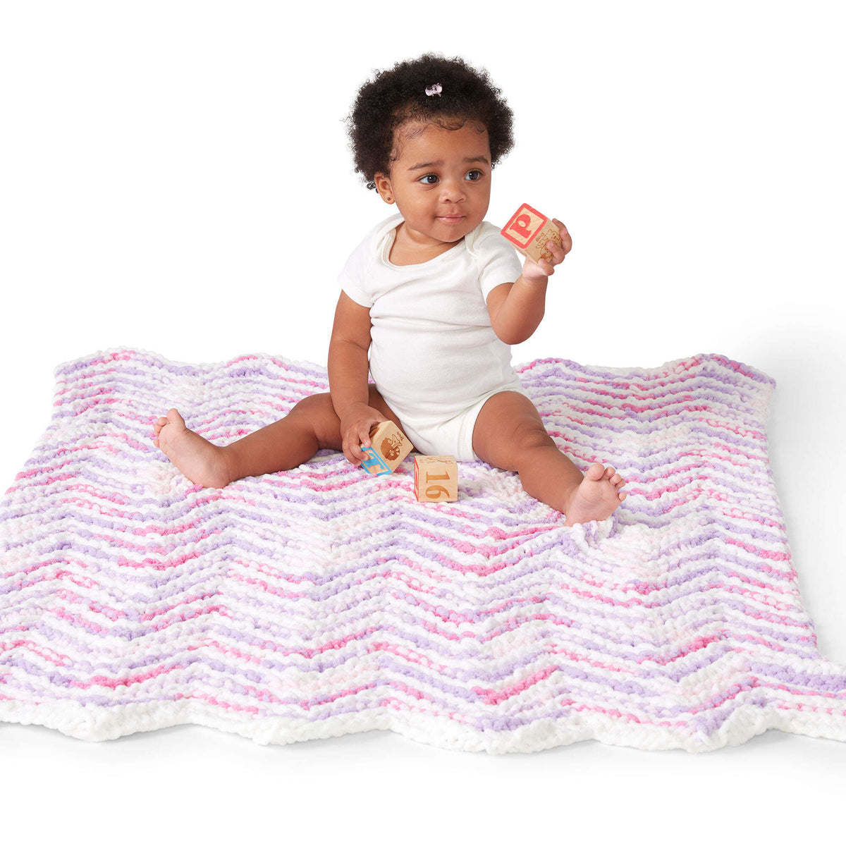 Knit Blanket made in Bernat Baby Blanket yarn