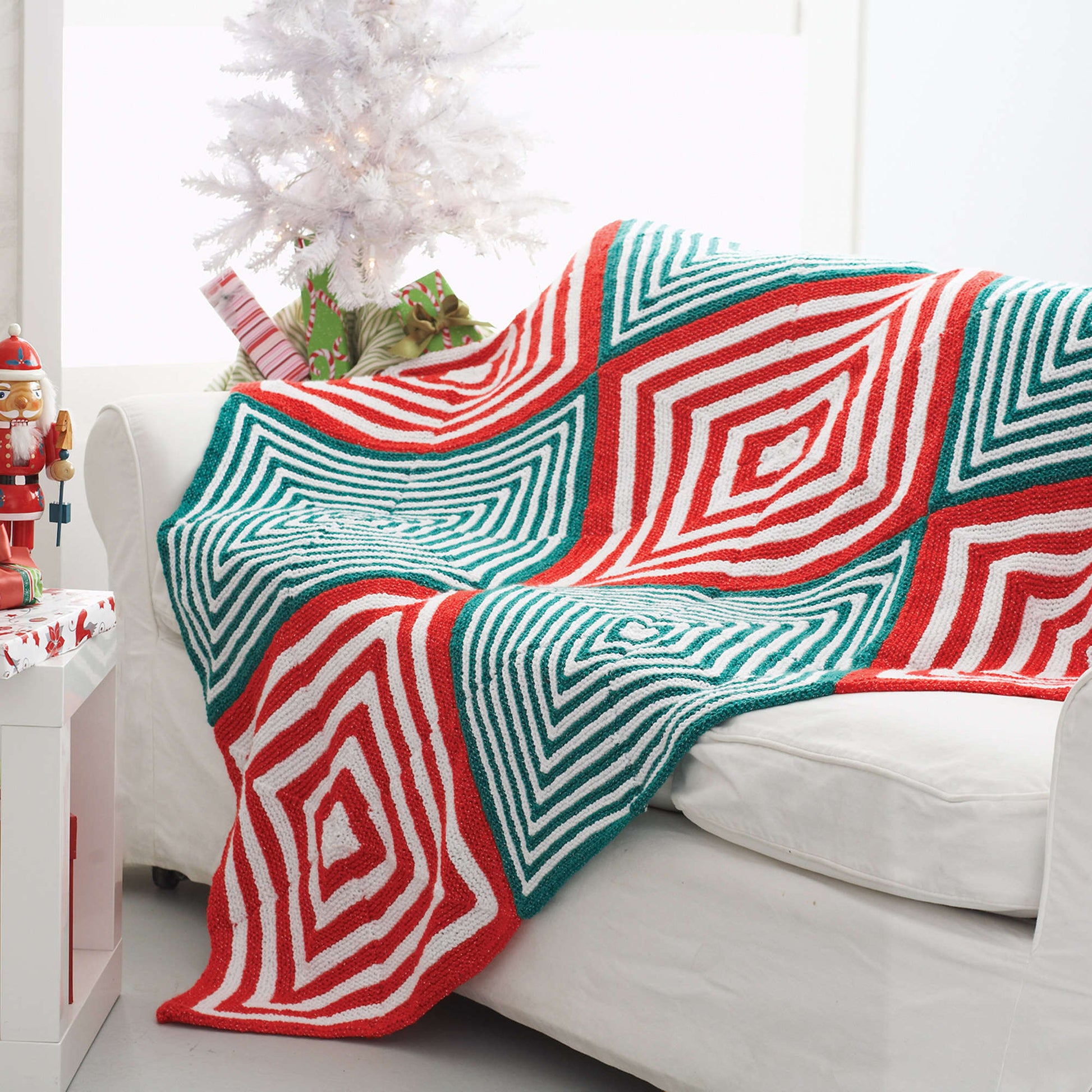 Free Bernat Mitered Christmas Knit Blanket Pattern