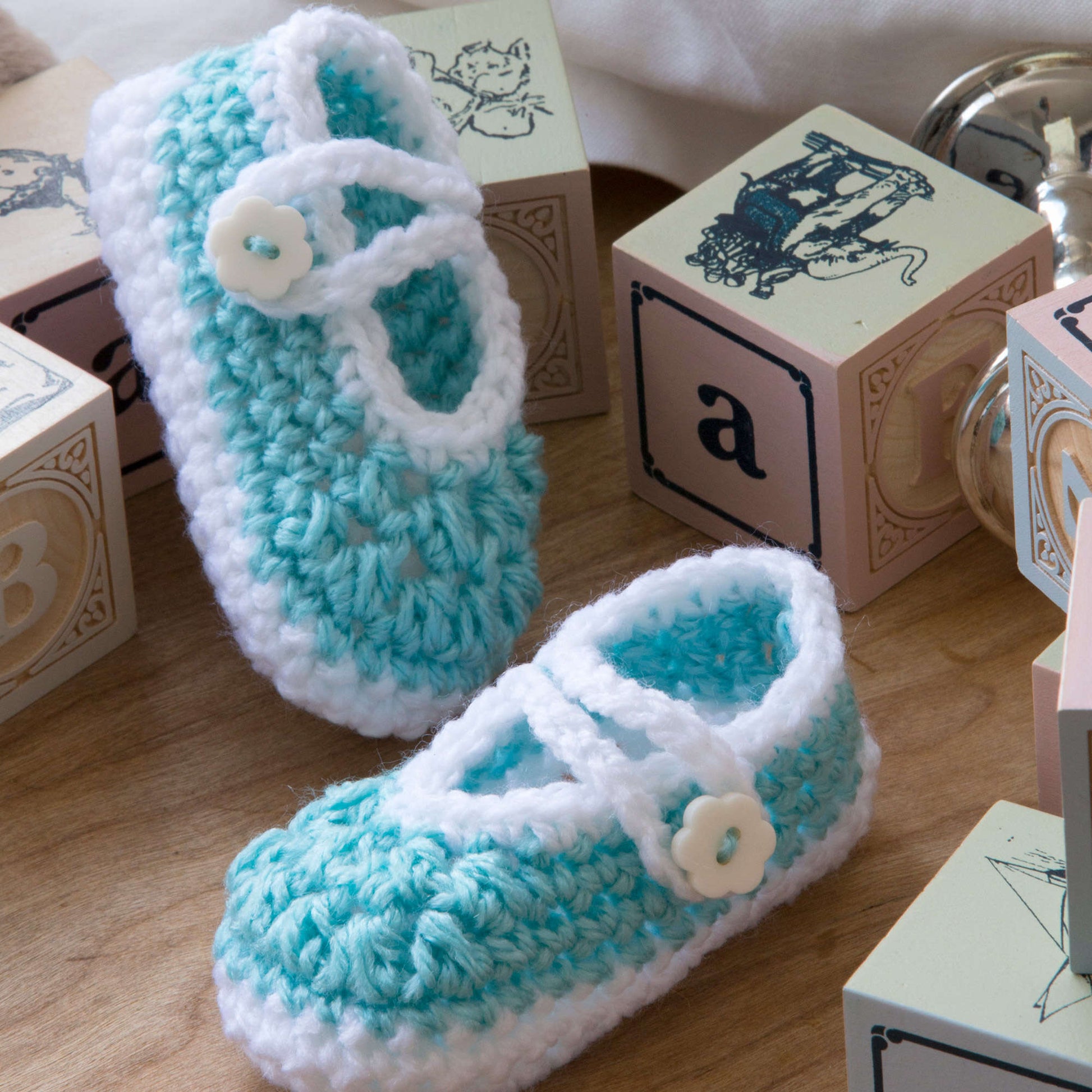 Free Red Heart Two-Color Baby Booties Crochet Pattern