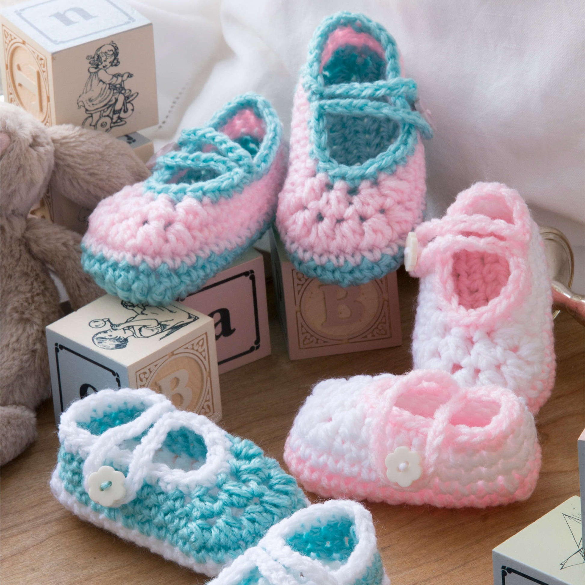 Free Red Heart Two-Color Baby Booties Crochet Pattern