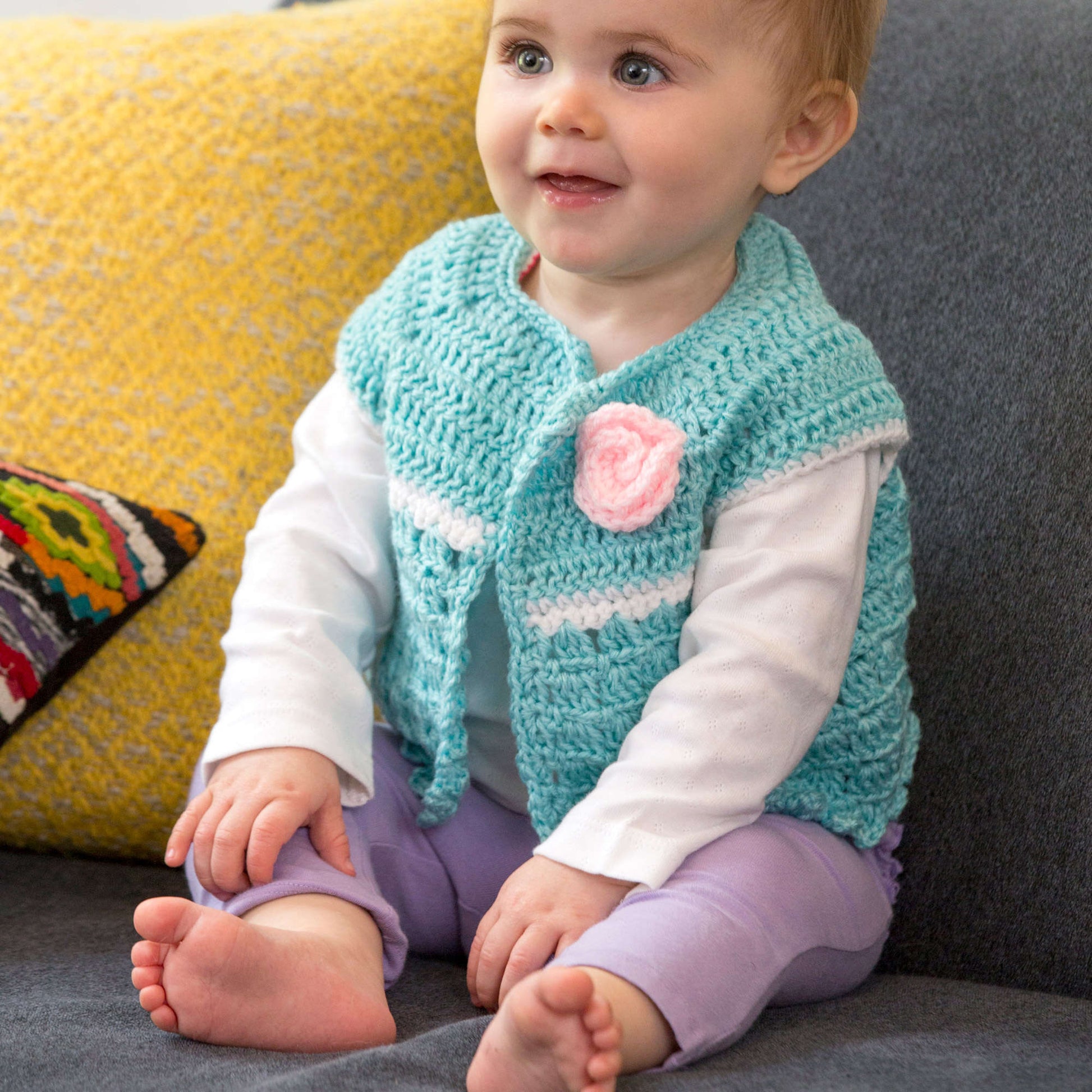 Free Red Heart Sweet Abby's Baby Sweater Crochet Pattern