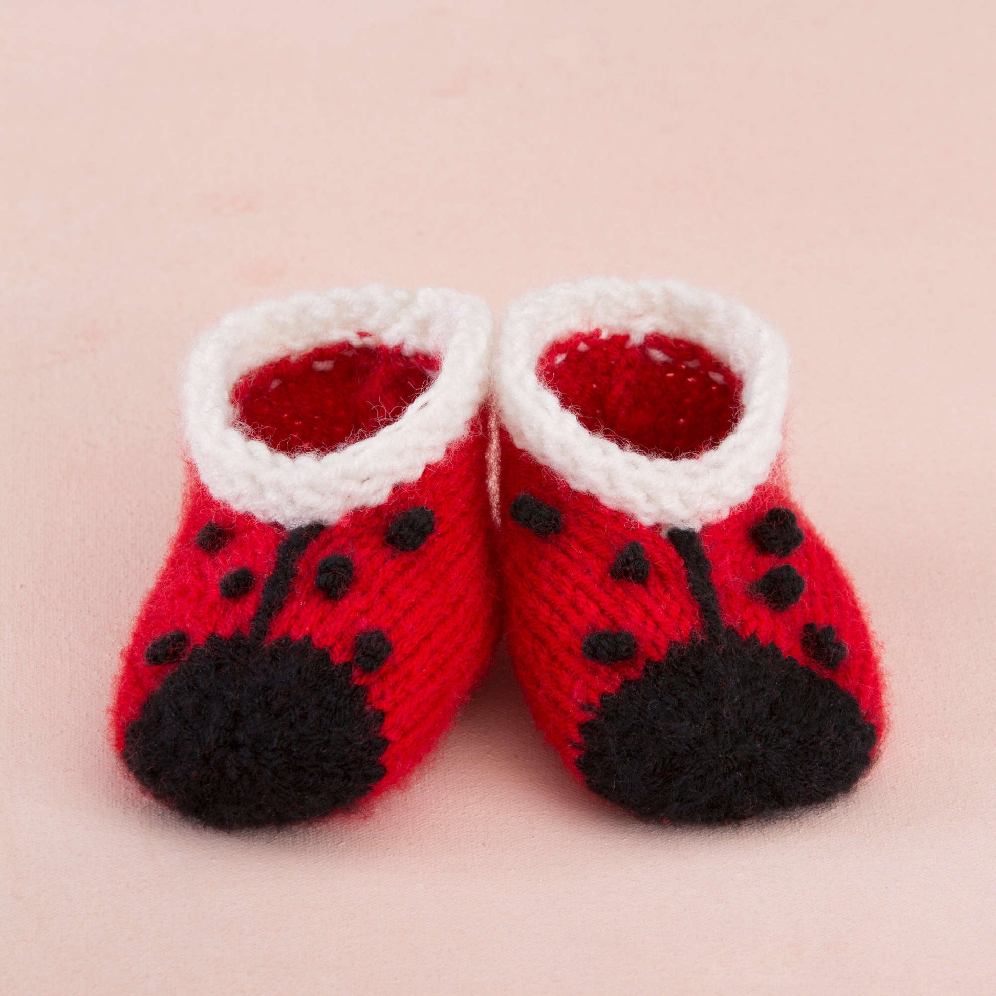 Free Red Heart Sweet Lady Bug Booties Knit Pattern