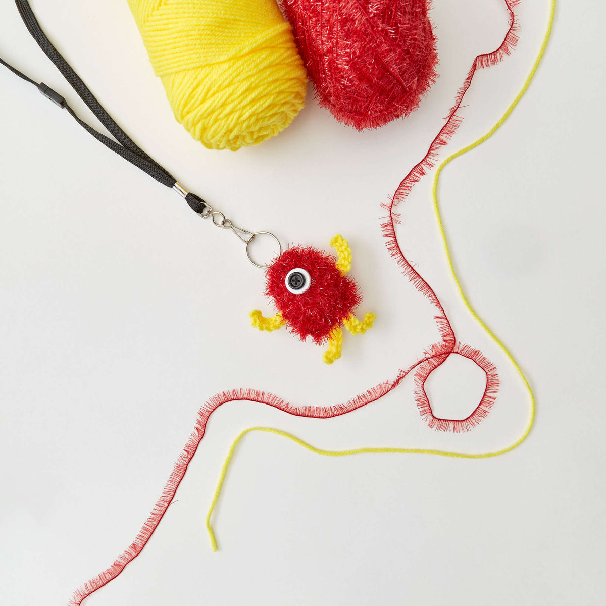 Knit Key Ring made in Red Heart Scrubby Sparkle Yarn