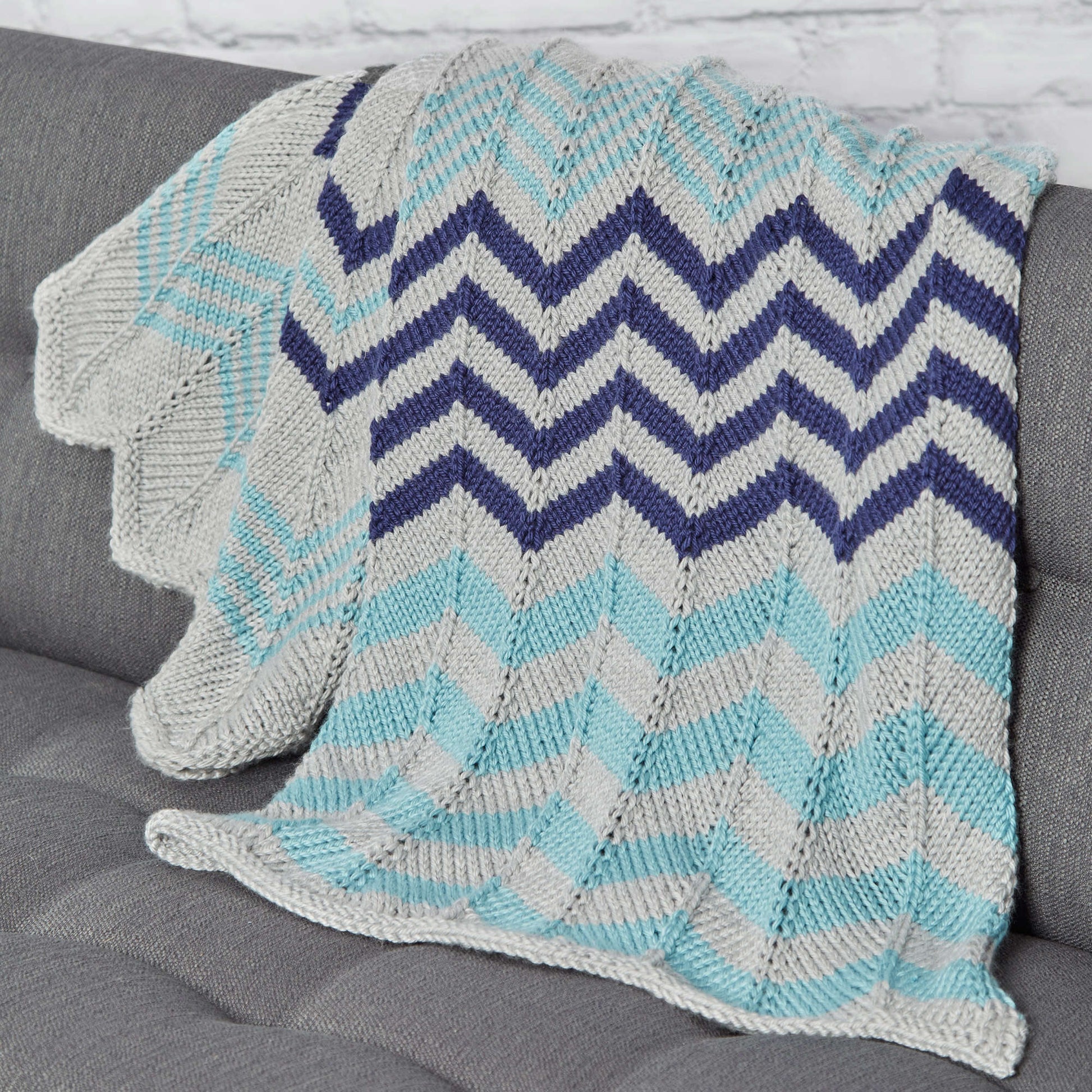 Free Red Heart Relaxing Ripple Throw Knit Pattern