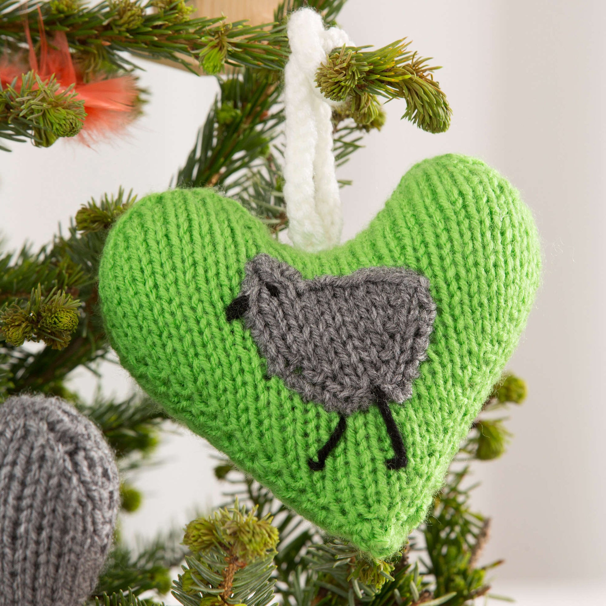 Free Red Heart Holiday Heart Ornaments Knit Pattern