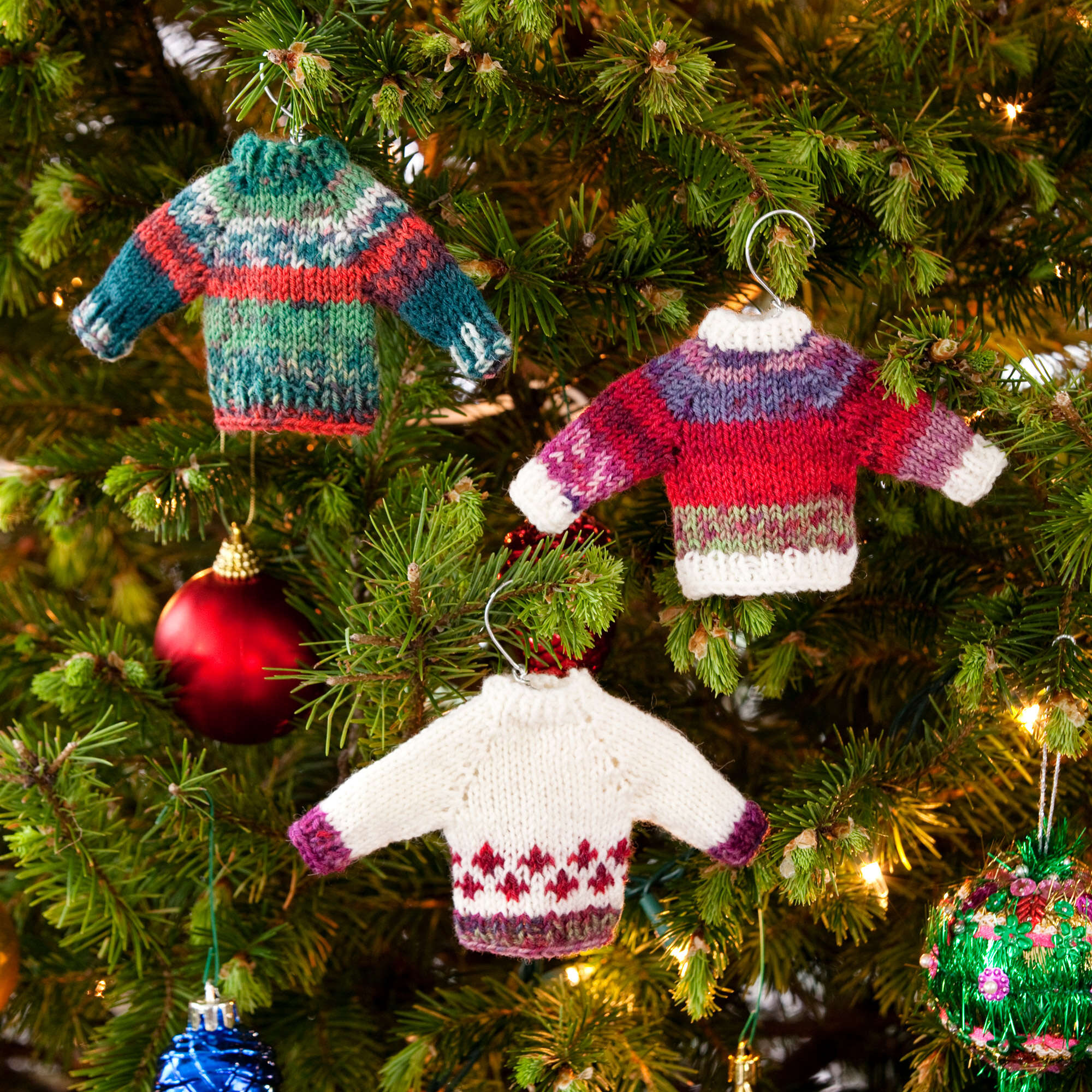 Free Red Heart Noel Sweater Ornaments Knitting Pattern