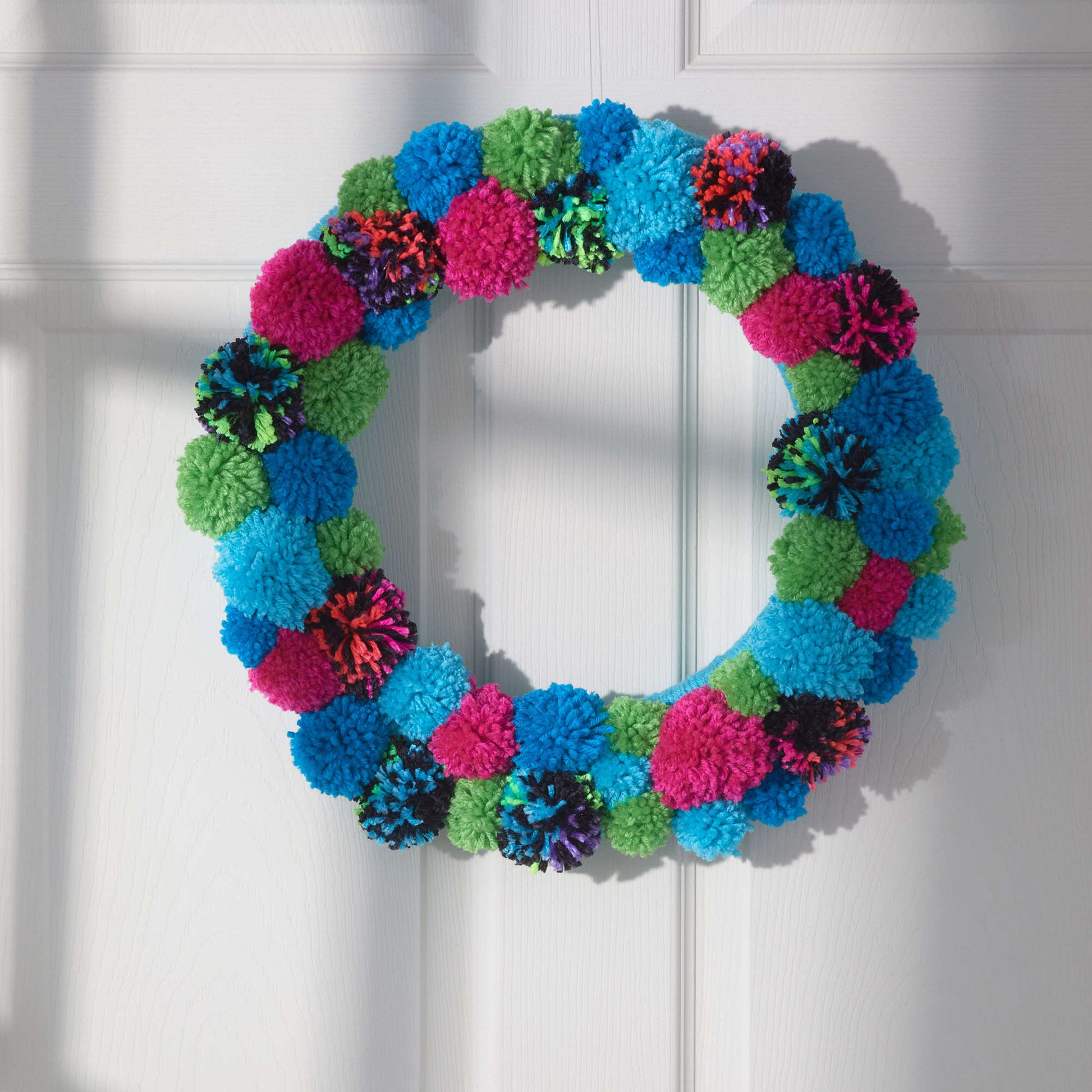 Free Red Heart Welcoming Pom Wreath Craft Pattern