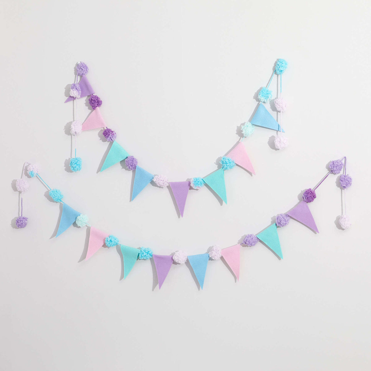 Craft Garland made in Red Heart Pomp-a-Doodle Yarn