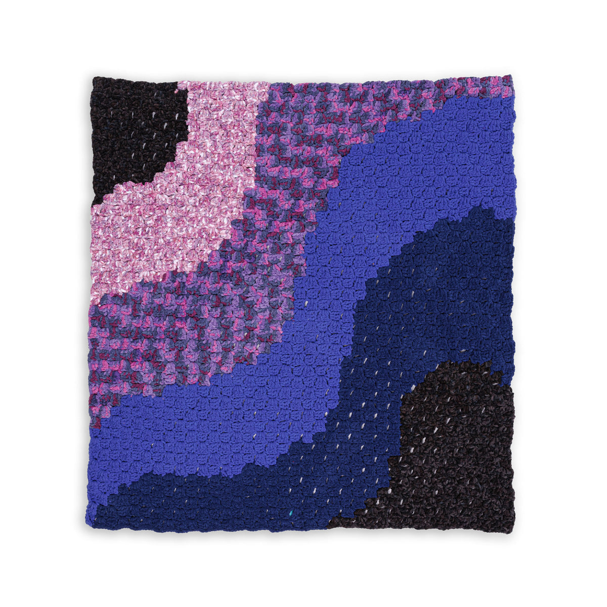 Space corner to corner crochet blanket made using Bernat yarn.