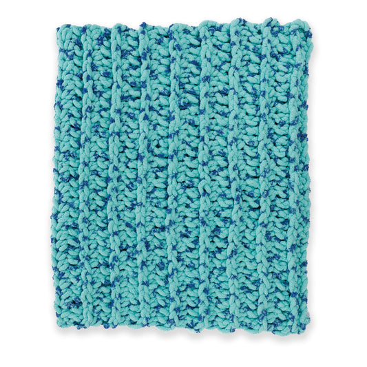 Ridged Big Crochet Blanket made using Bernat yarn on a white background