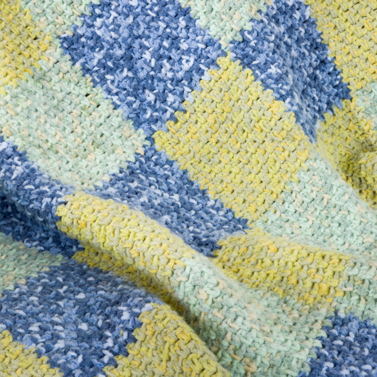Misty Hollow Crochet Checkerboard Blanket made using Bernat yarn