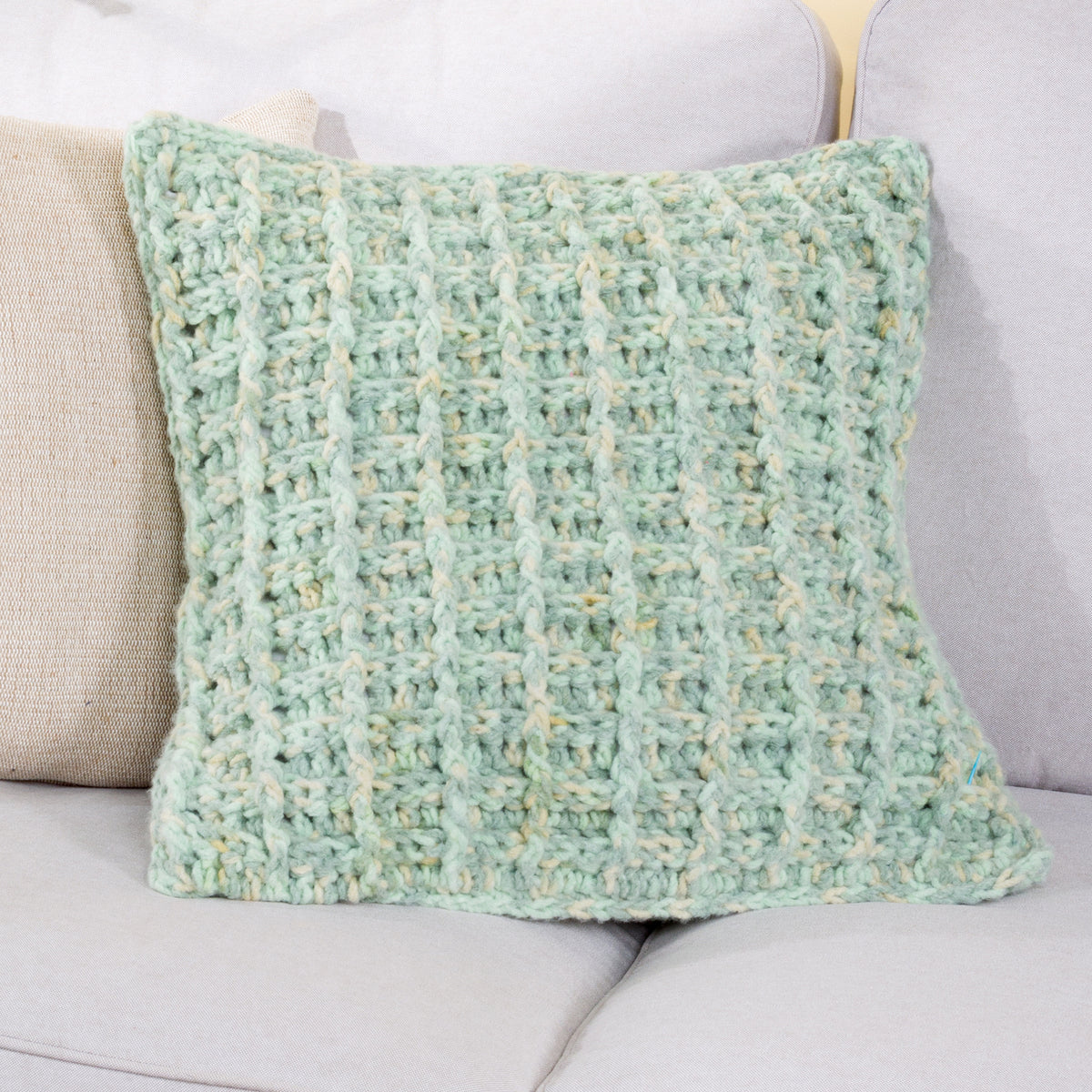 Wisp And Wonder Crochet Waffle Stitch Pillow made using Bernat yarn
