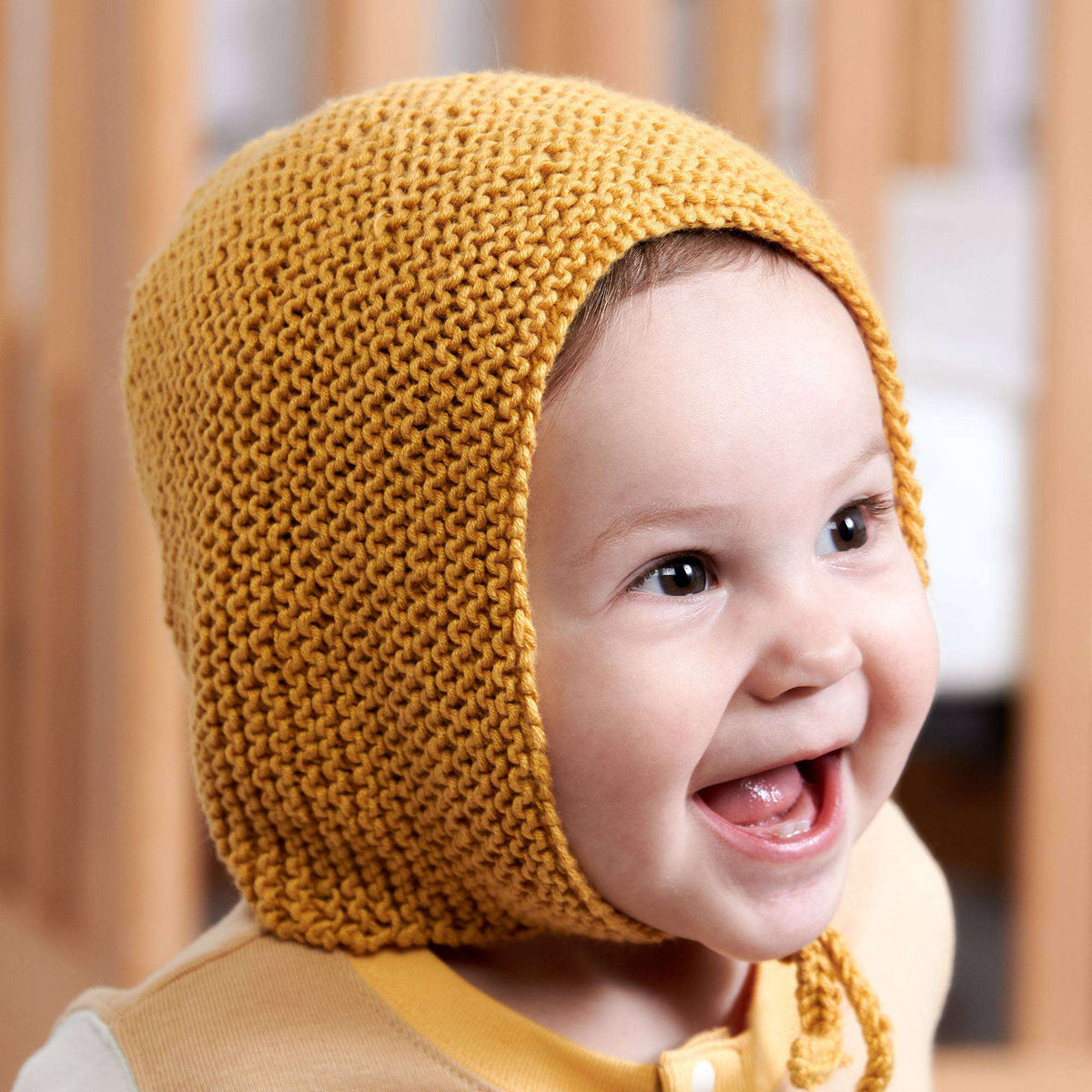 Knit Bonnet made in Bernat Softee Baby Yarn