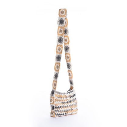 Caron Crochet Tie Top Tote Crochet Tie Top Tote made using Caron yarn on a white background