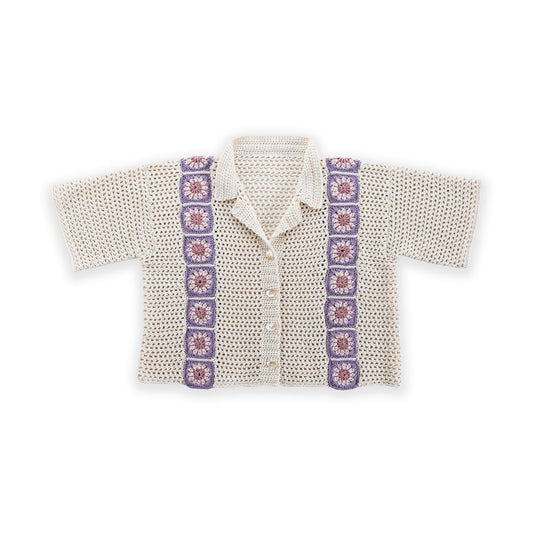 Crochet Cabana Shirt With Detail made using Caron yarn on a white background