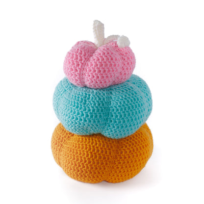Red Heart Crochet Pumpkin Topiary Stack of colorful crochet pumpkins on a white background