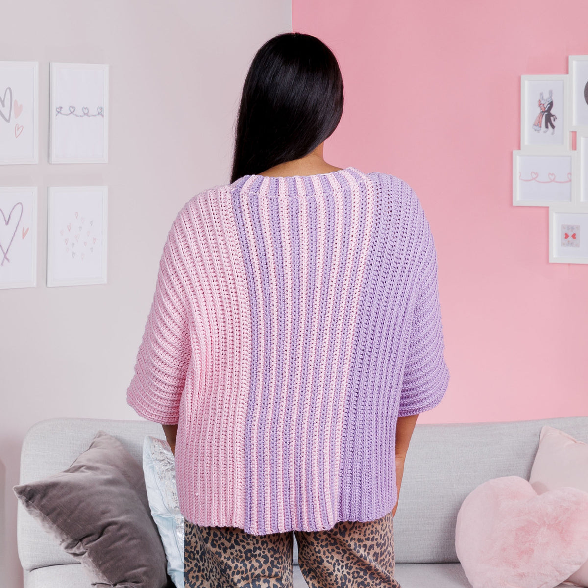 Crochet sweater with purple and pink gradient made using Red Heart Yarns.
