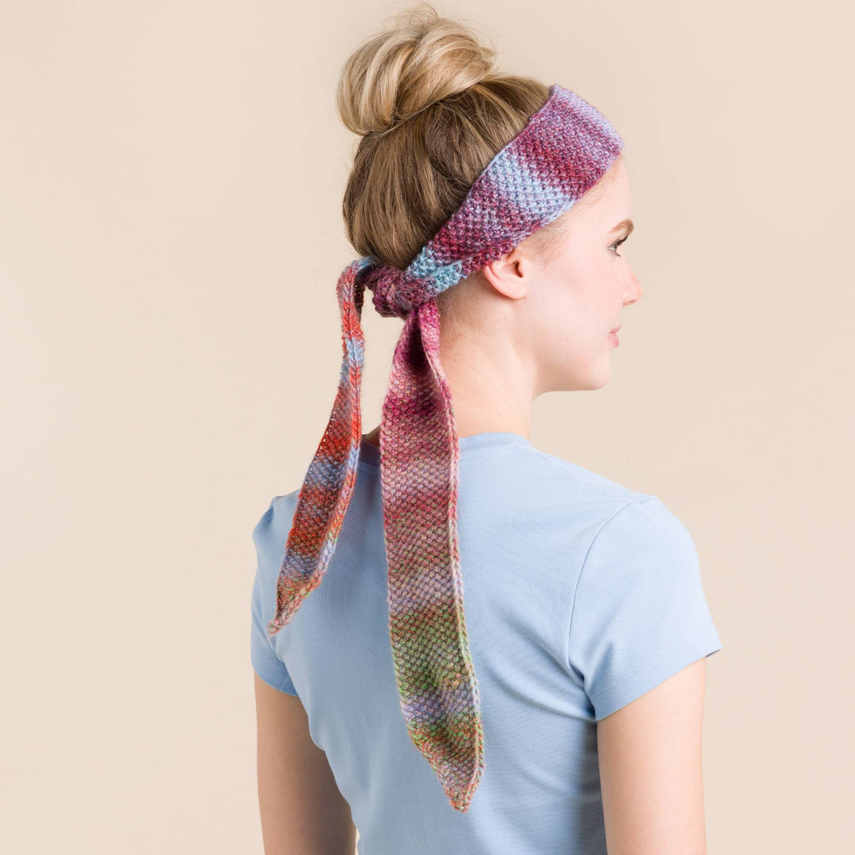 Knit Bow made in Red Heart Roll With It Melange Yarn