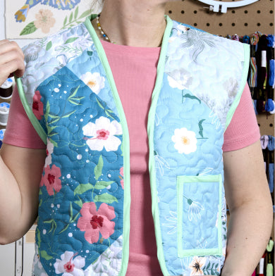 Learn to create your own cozy, quilted vest blog banner.