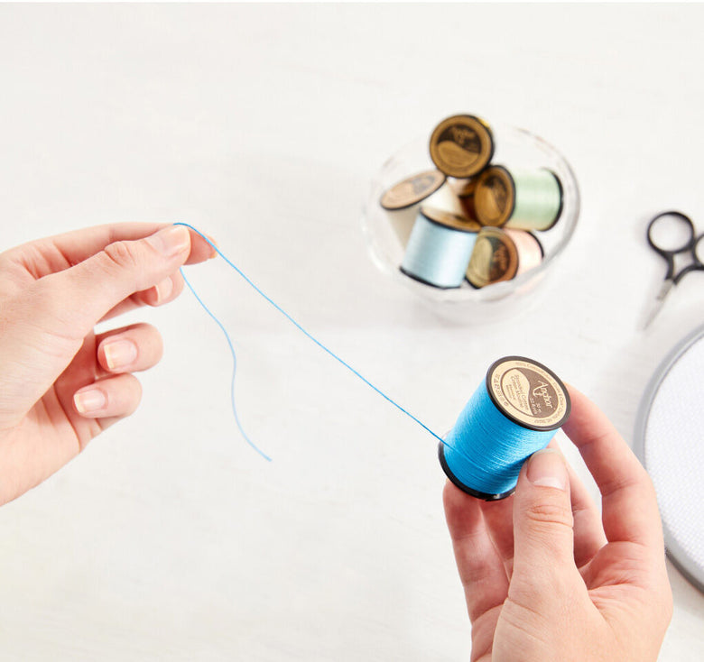 anchor embroidery floss on spool in blue