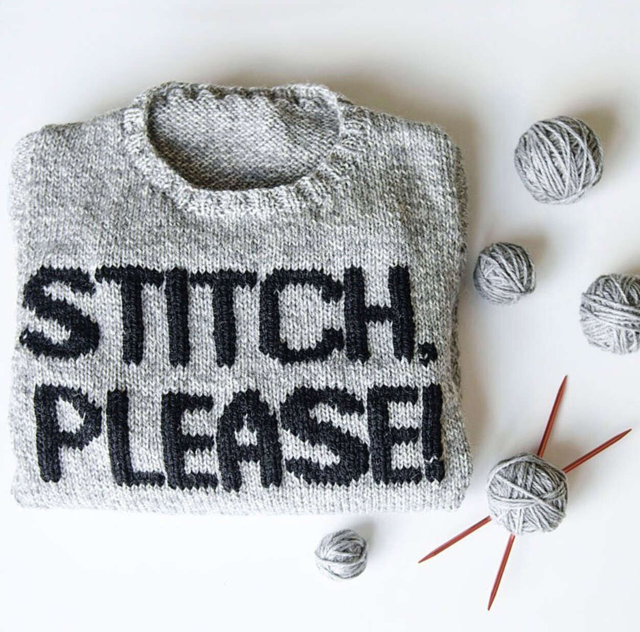 Gray knit sweater with Stitch Please.