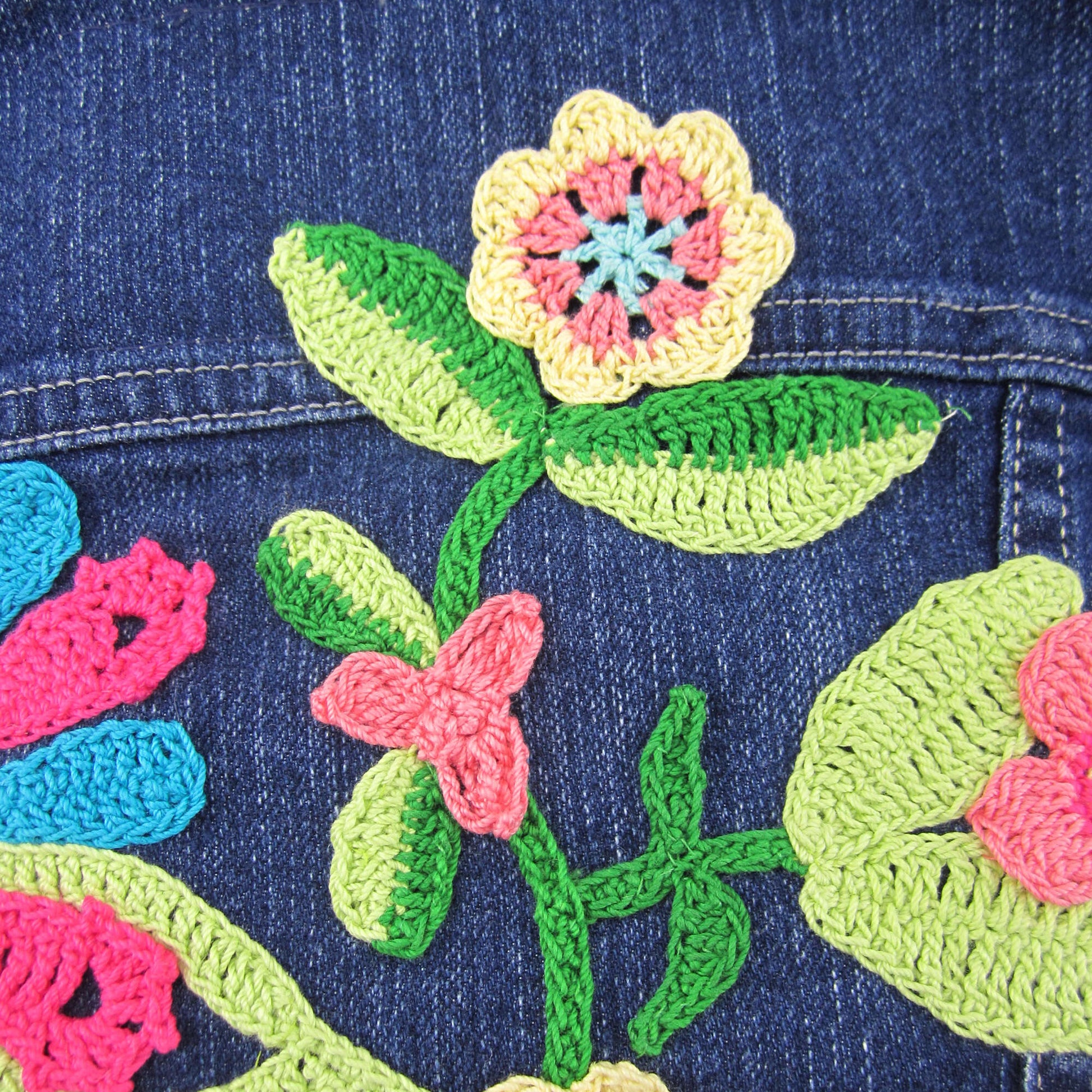 Free Aunt Lydia's Be-Flowered Denim Jacket Crochet Pattern