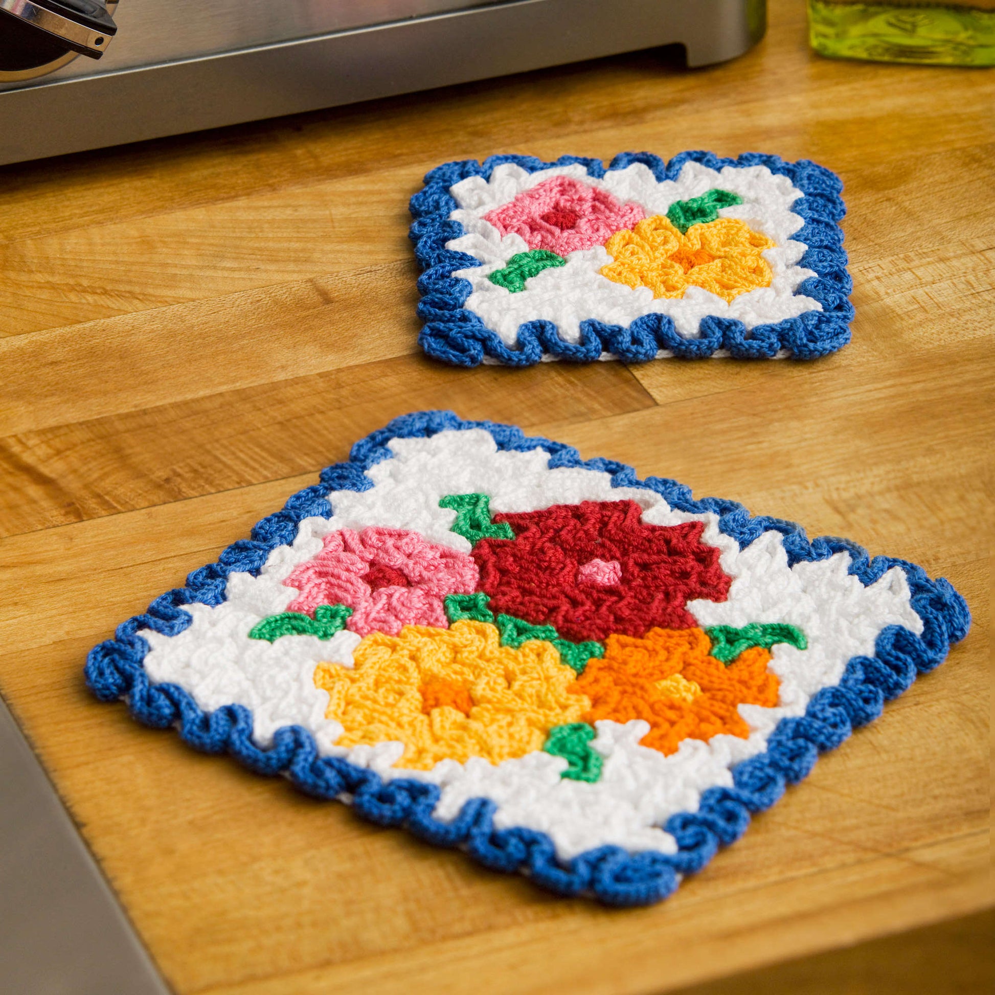 Free Aunt Lydia's Crochet May Flowers Hot Pad & Coaster Set Pattern