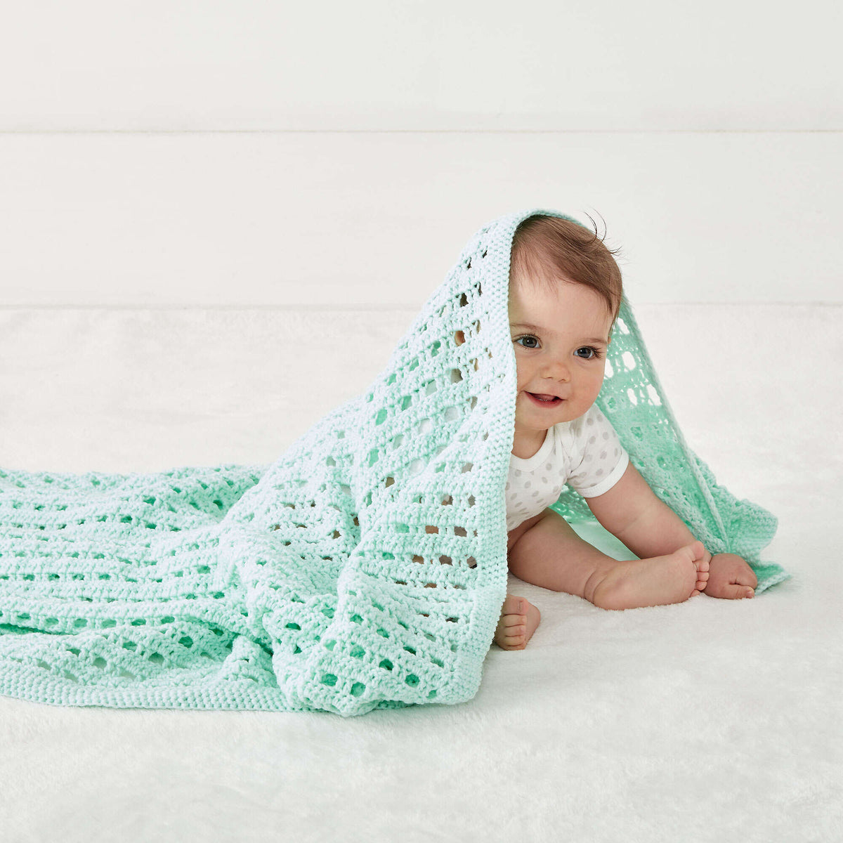 Crochet Blanket made in Bernat Baby Sport yarn