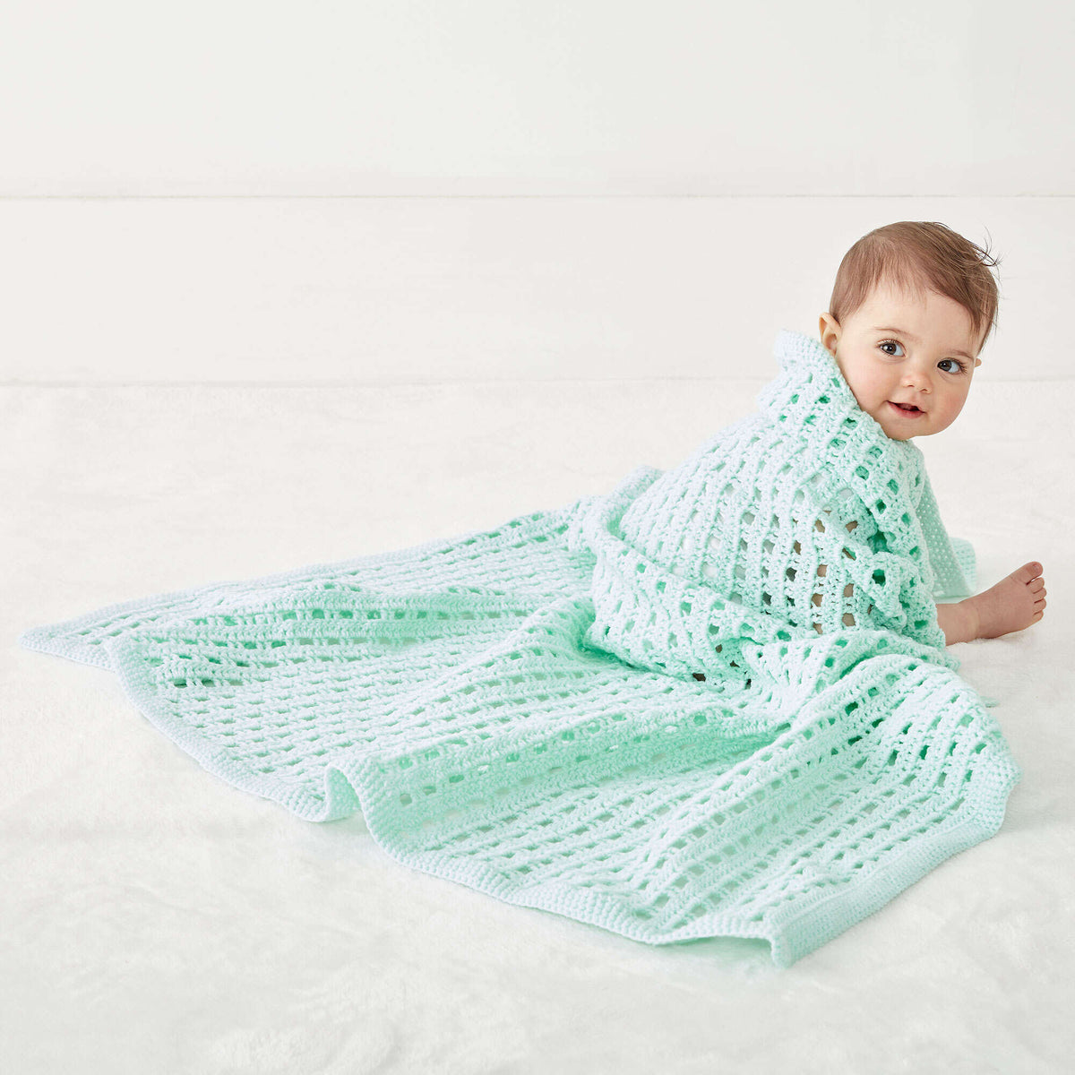 Crochet Blanket made in Bernat Baby Sport yarn