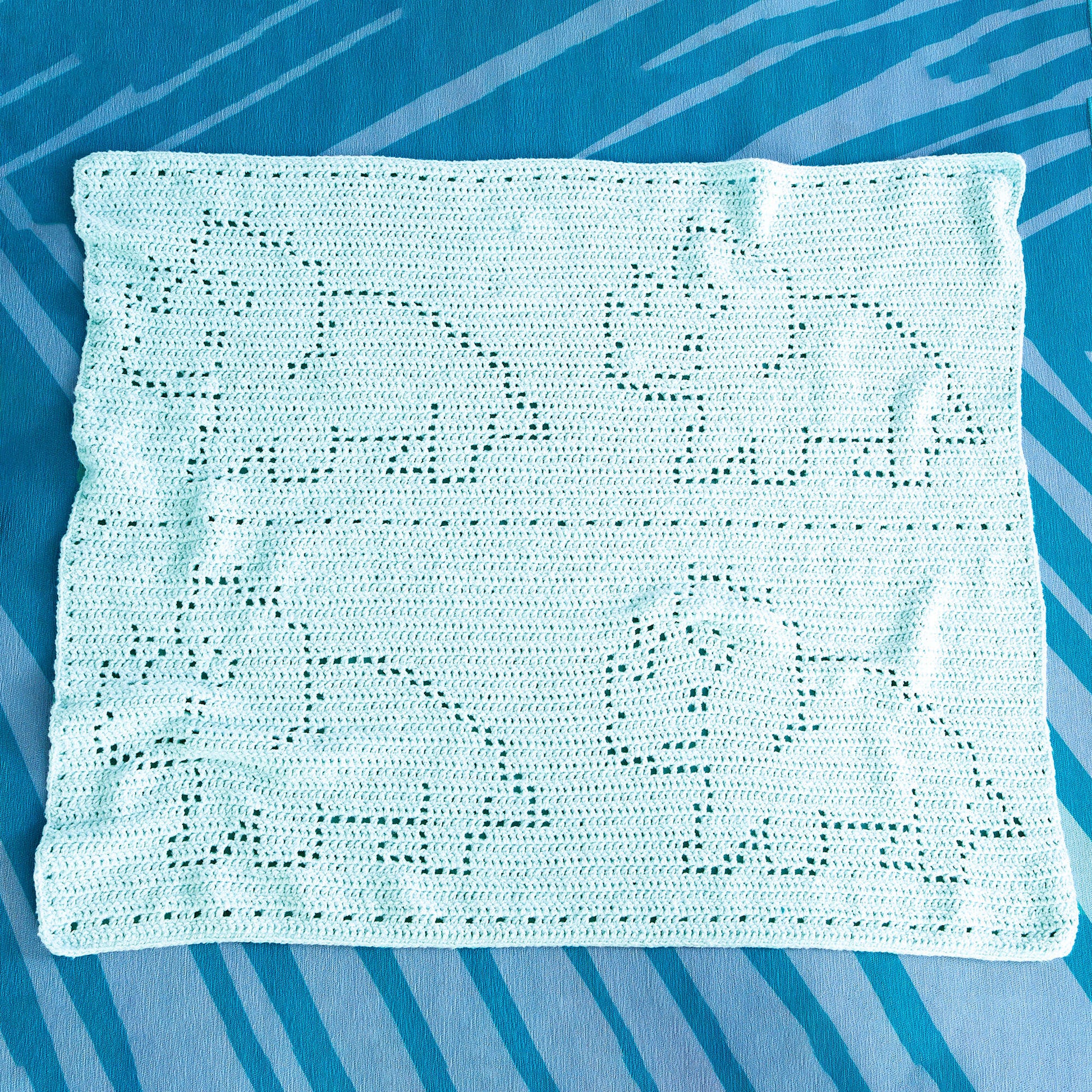 Free Bernat Filet Crochet Dinosaur Baby Blanket Pattern