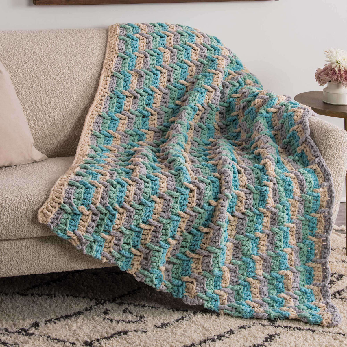Crochet Blanket made in Bernat Blanket Sparkle yarn