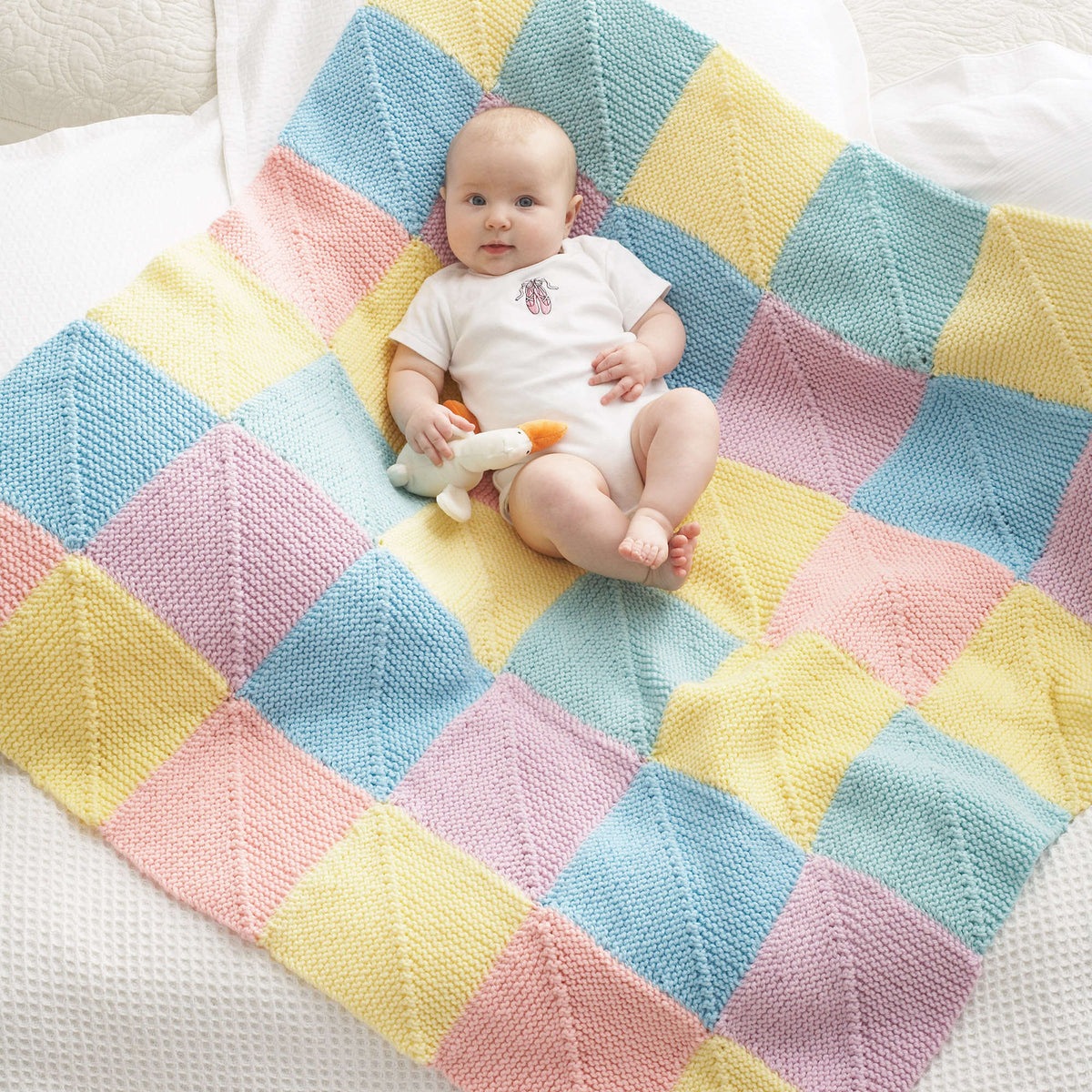 Knit Blanket made in Bernat Giggles yarn