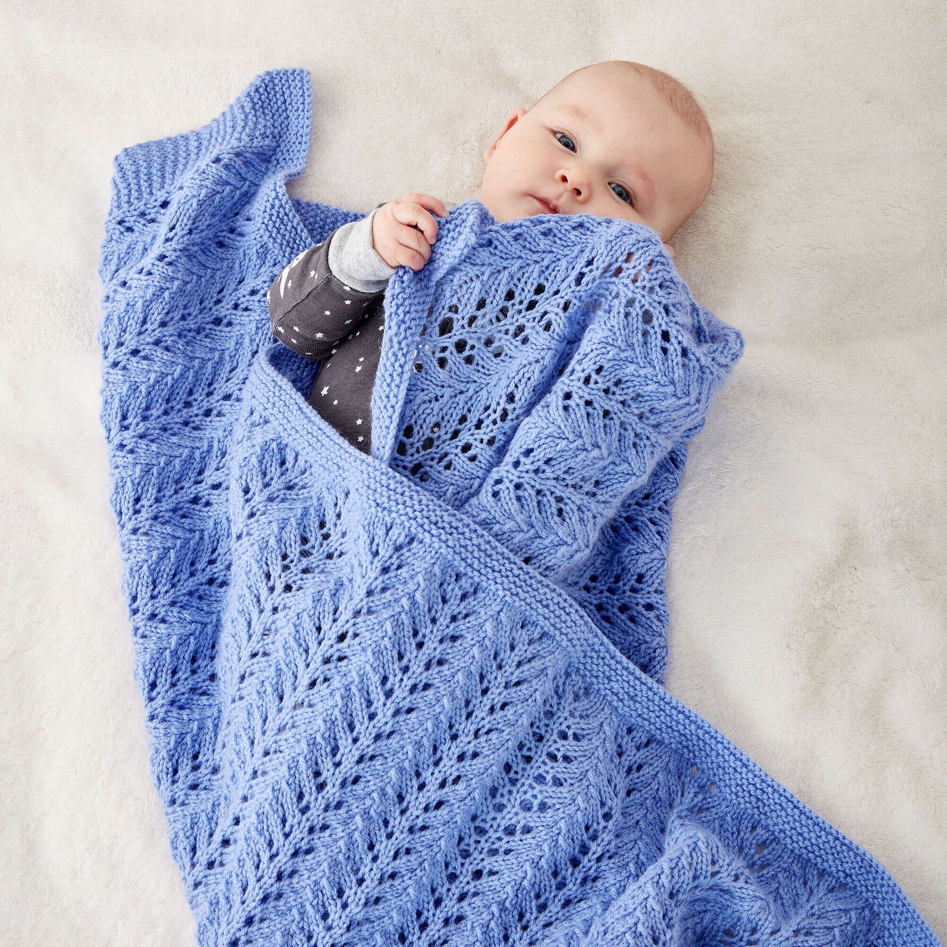 Free Bernat Lacy Knit Baby Blanket Pattern