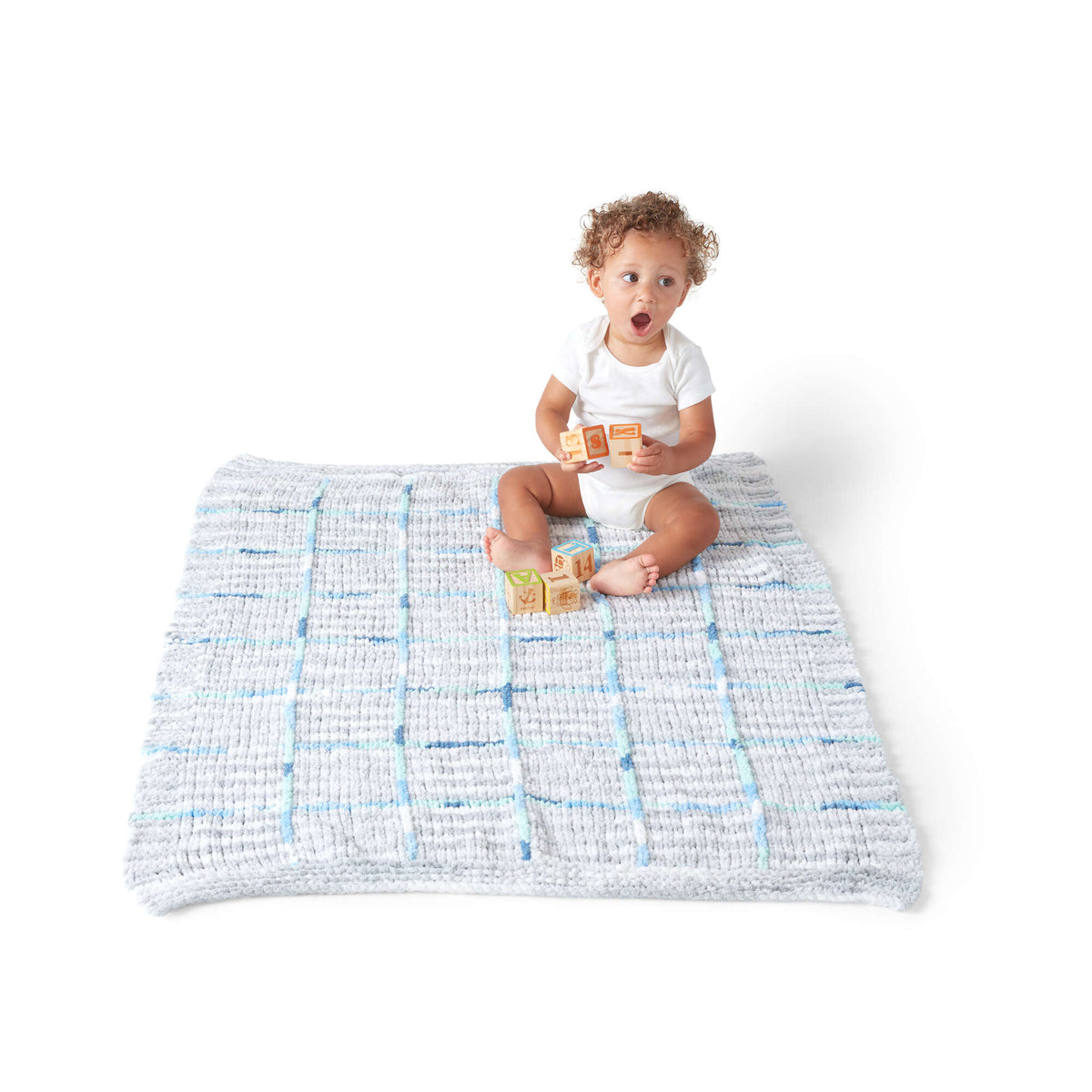 Knit Blanket made in Bernat Baby Blanket yarn