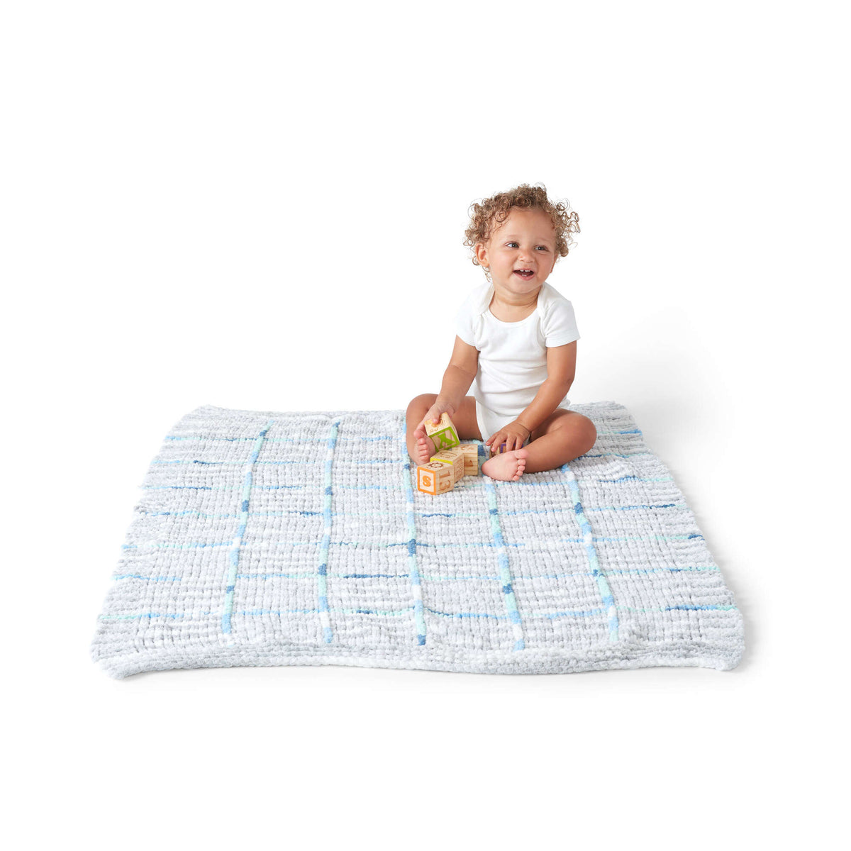 Knit Blanket made in Bernat Baby Blanket yarn