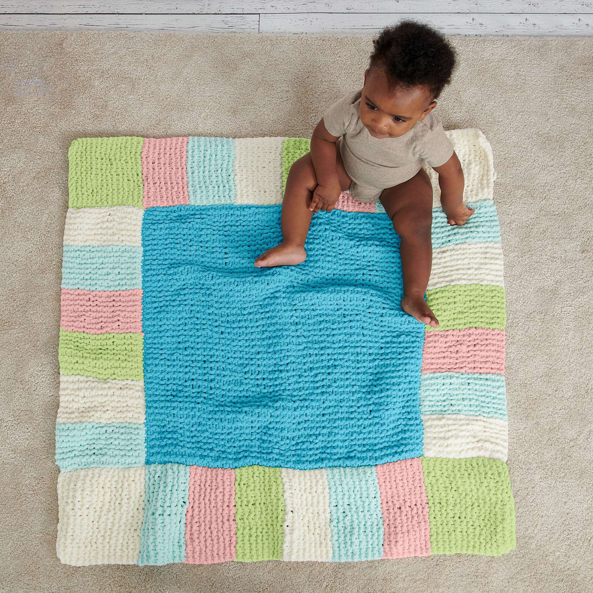 Knit Blanket made in Bernat Baby Blanket yarn